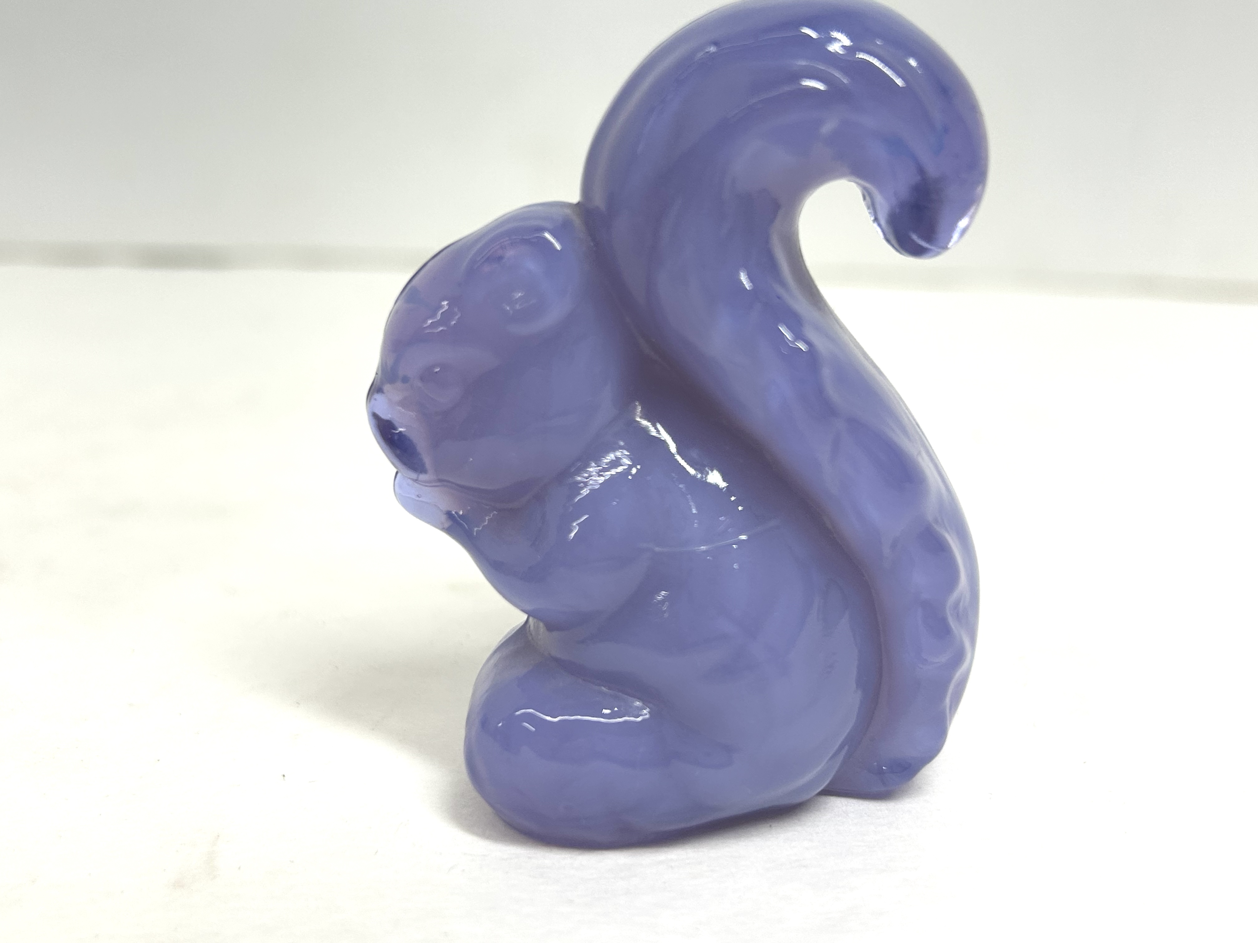 BOYD PURPLE GLASS SQUIRREL FIGURINES, 20TH CENTURY