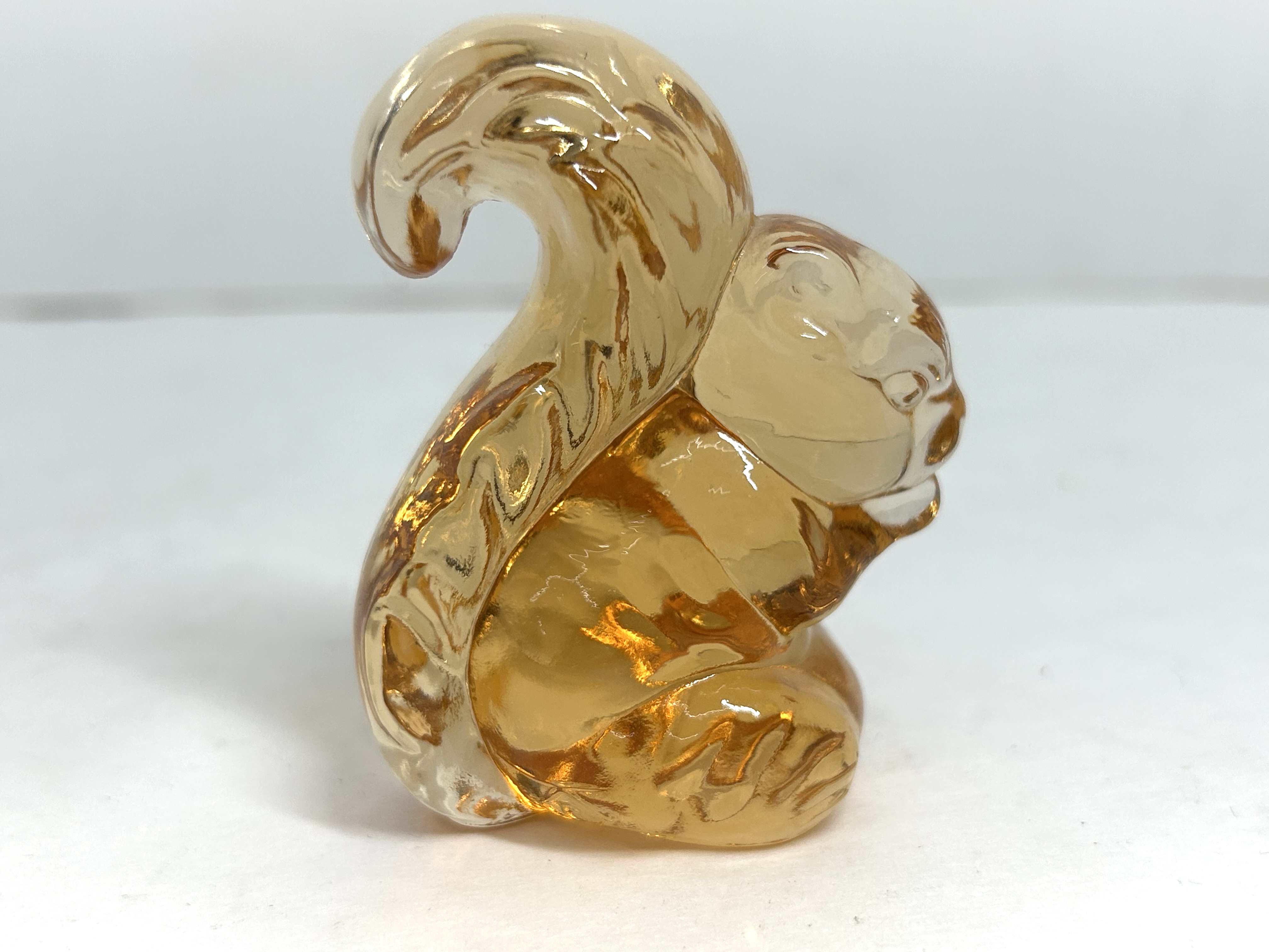 BOYD PEACH SQUIRREL FIGURINE