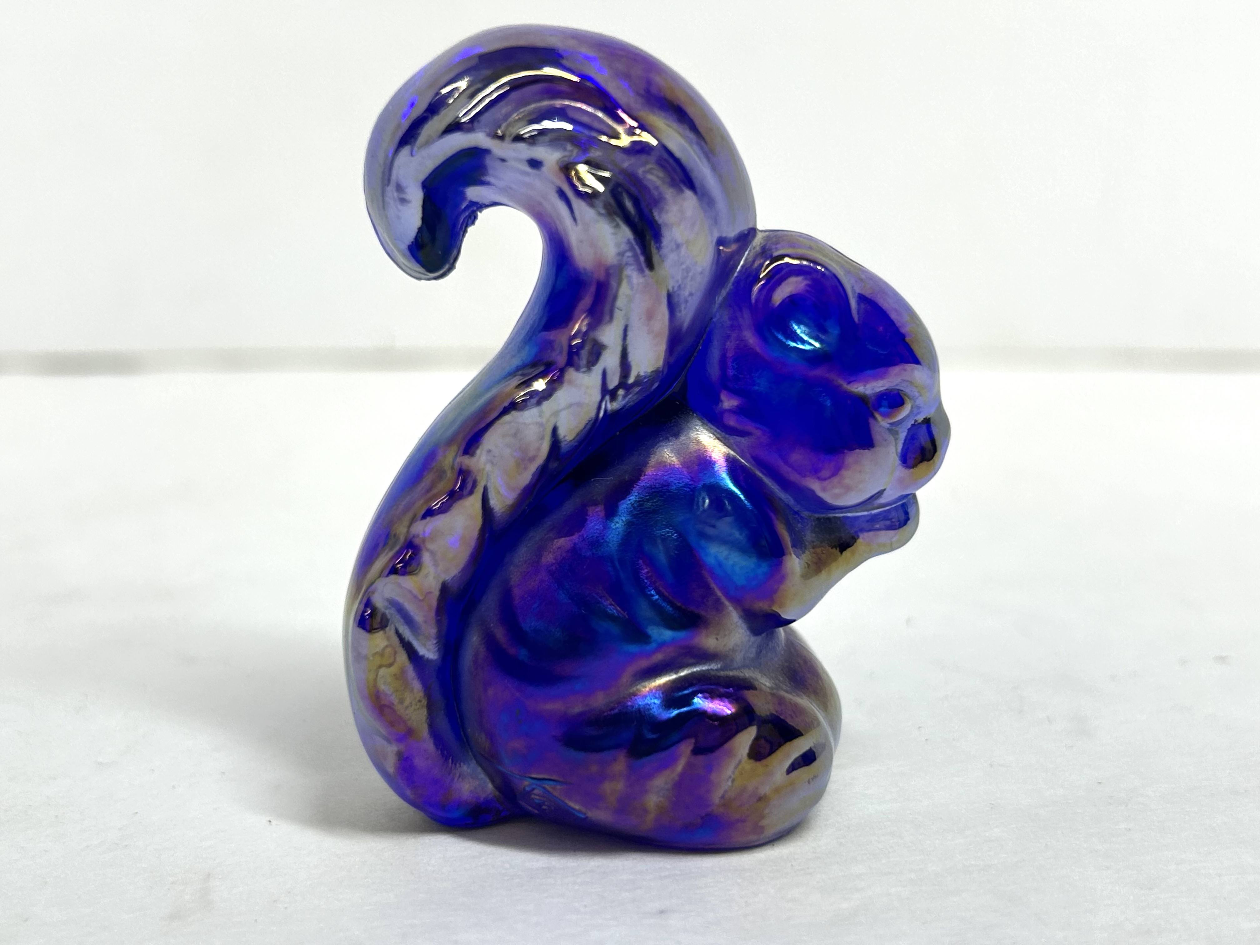 VIBRANT BLUE CARNIVAL BOYD SQUIRREL, MID-20TH CENTURY