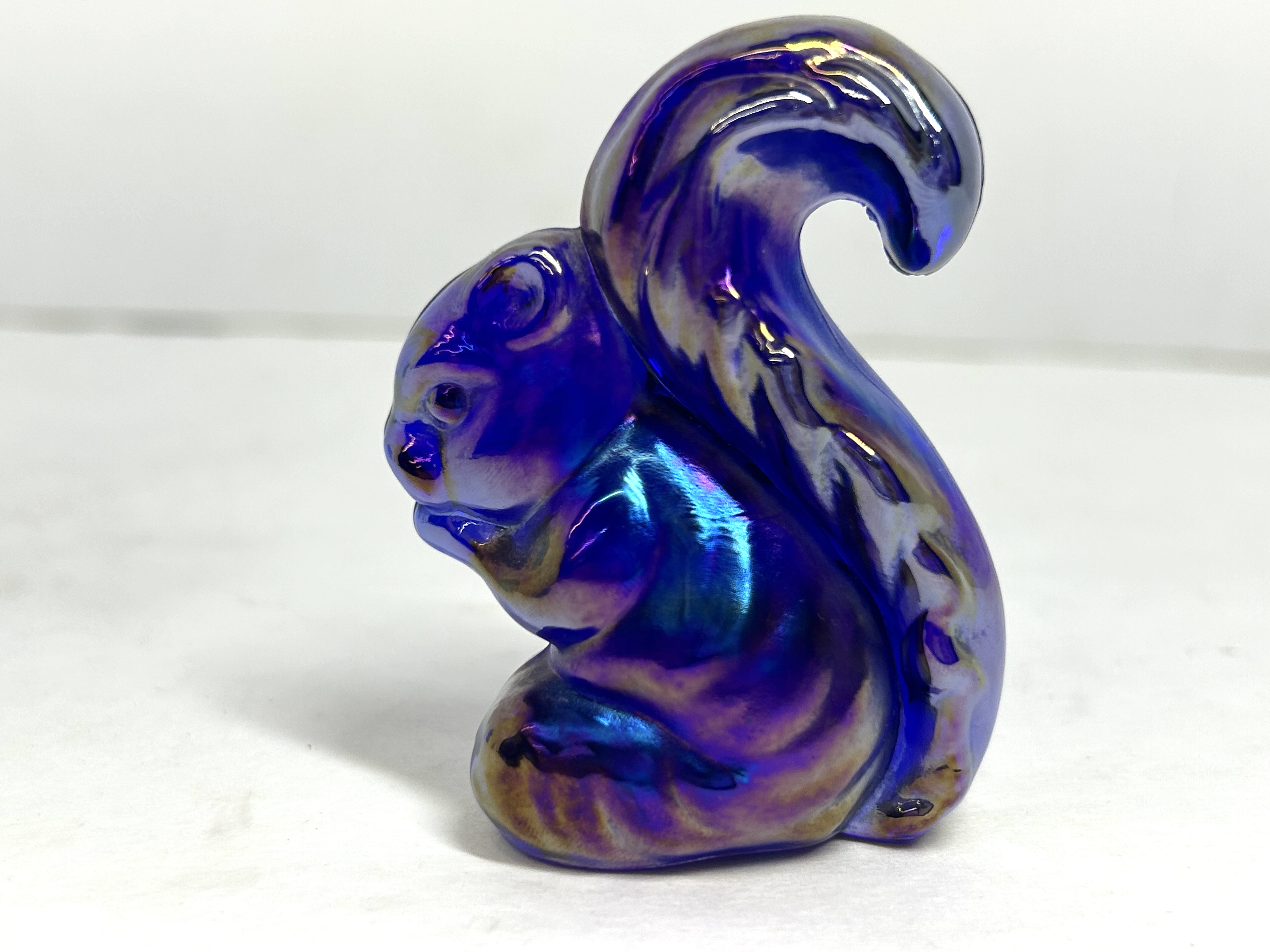 VIBRANT BLUE CARNIVAL BOYD SQUIRREL, MID-20TH CENTURY