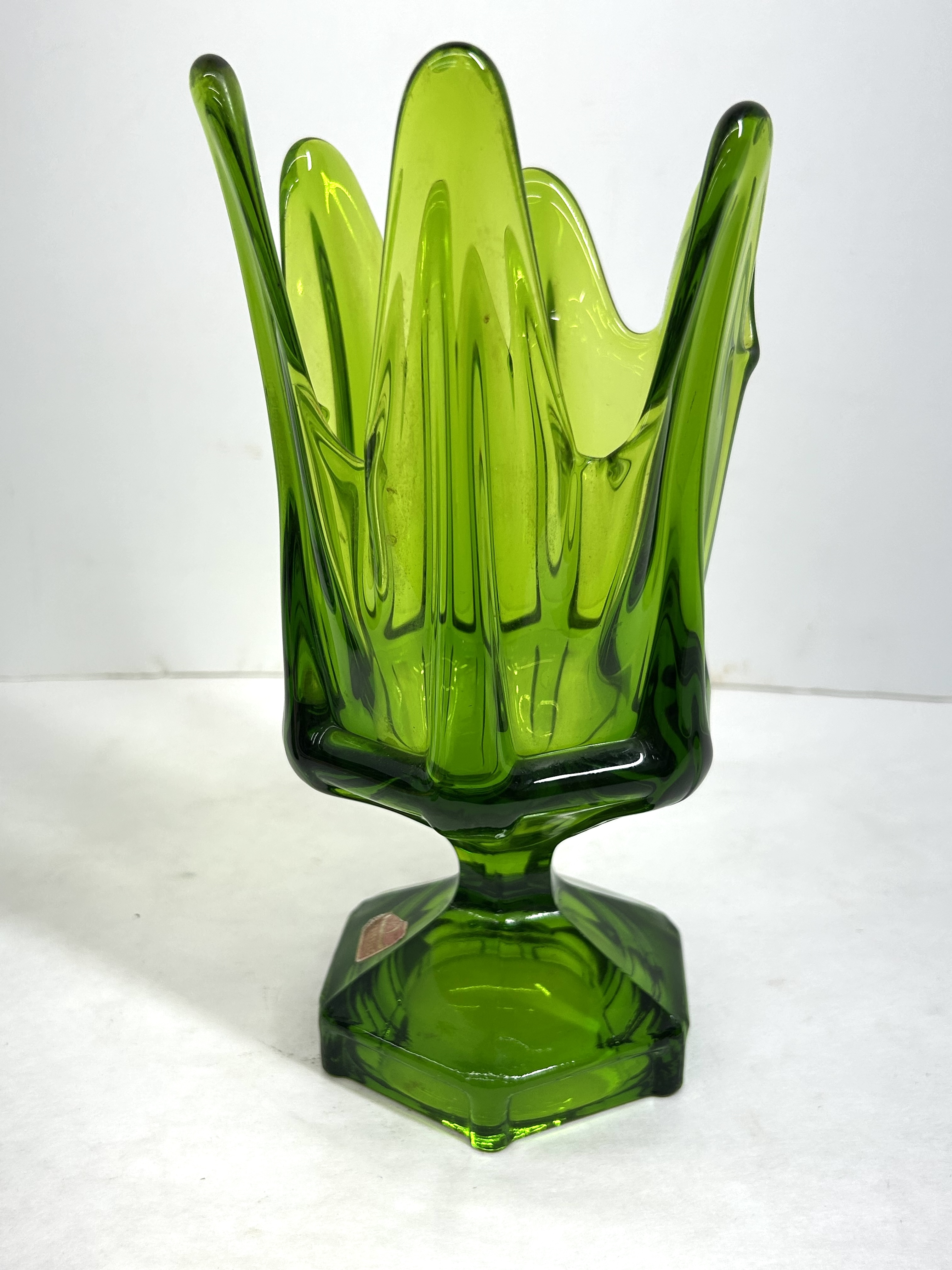 VIKING GREEN GLASS SWUNG VASE, CIRCA 1960