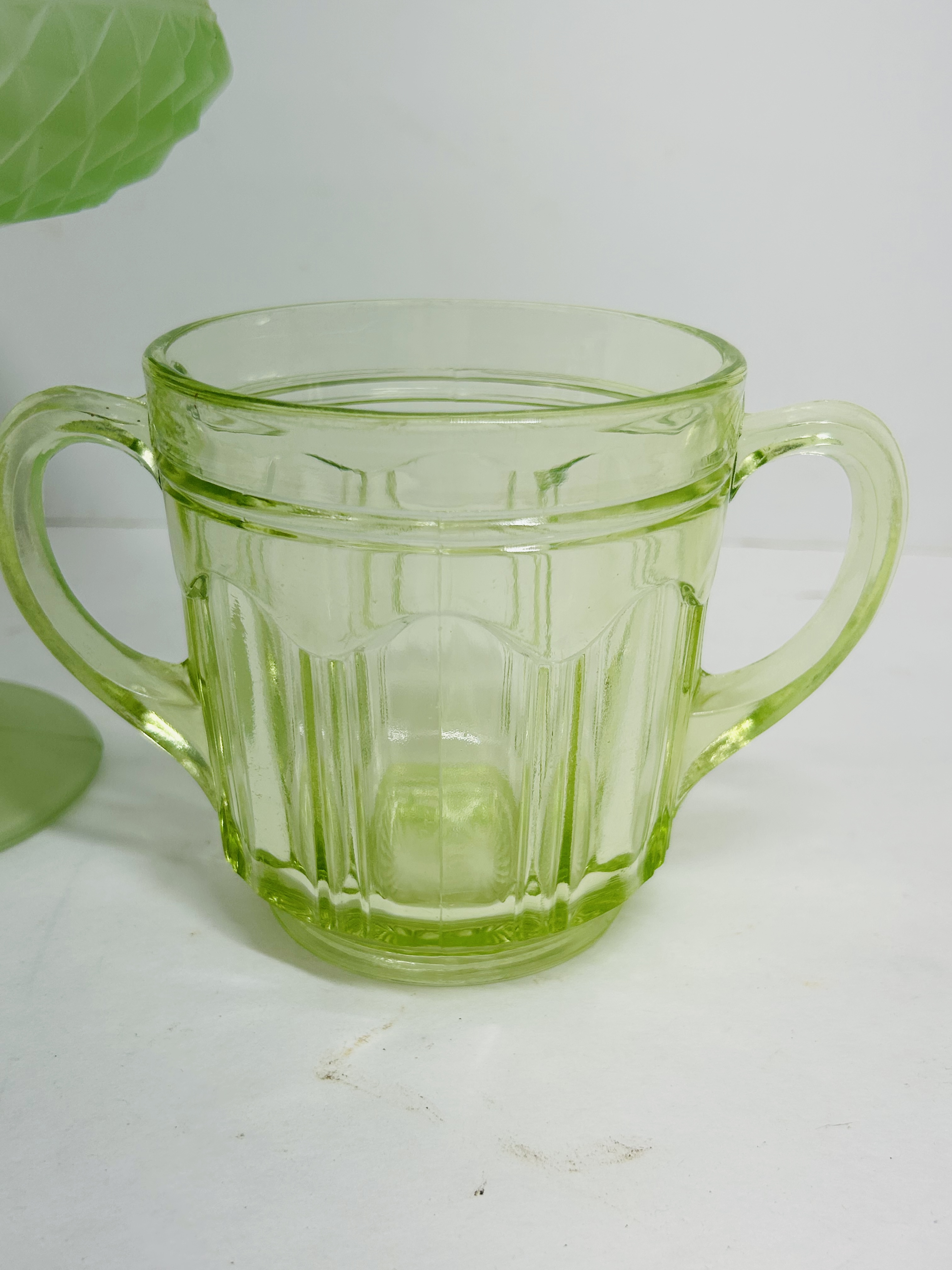 TWO ITEMS OF GREEN DEPRESSION GLASS, CIRCA 1930