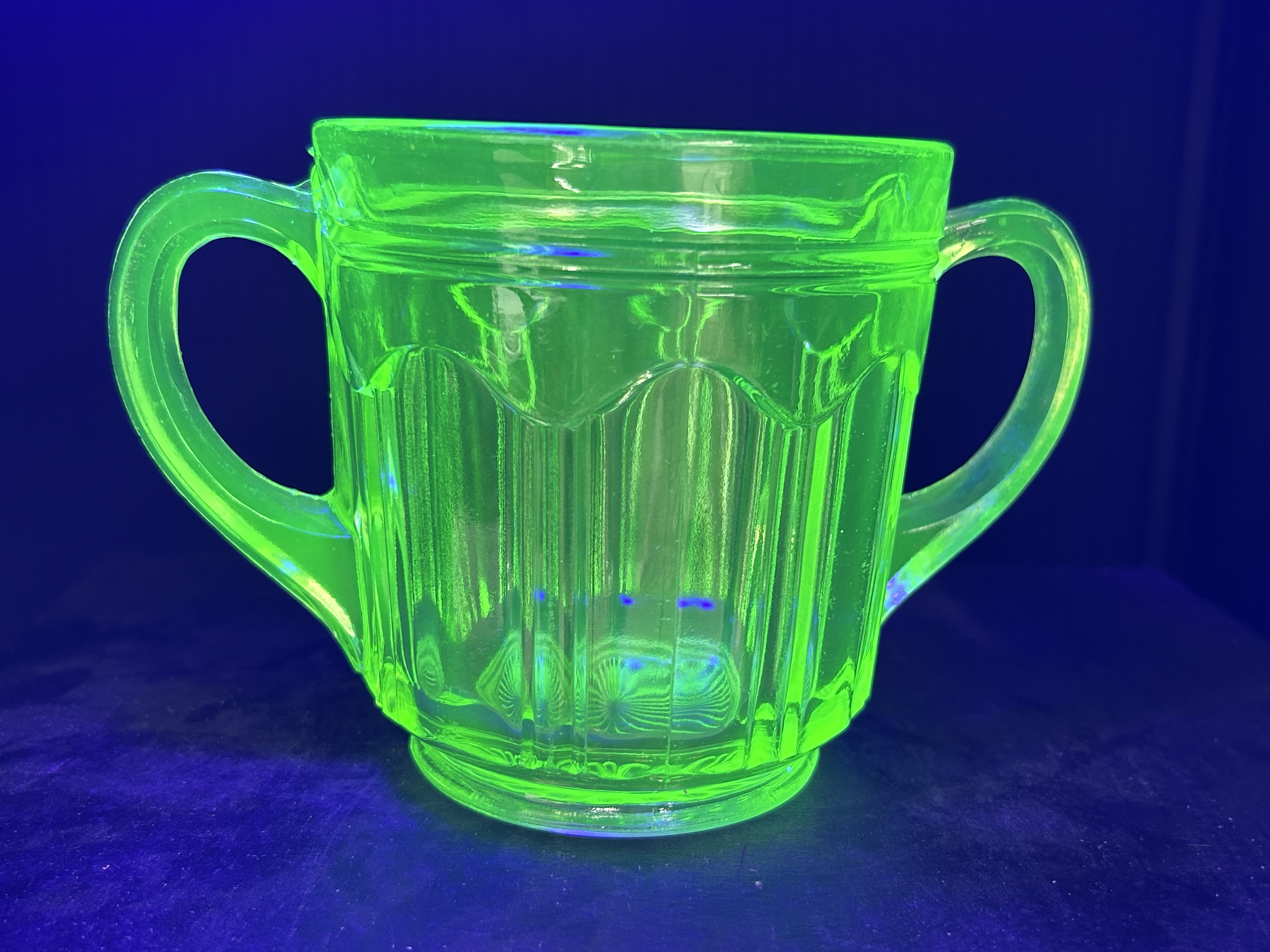 TWO ITEMS OF GREEN DEPRESSION GLASS, CIRCA 1930