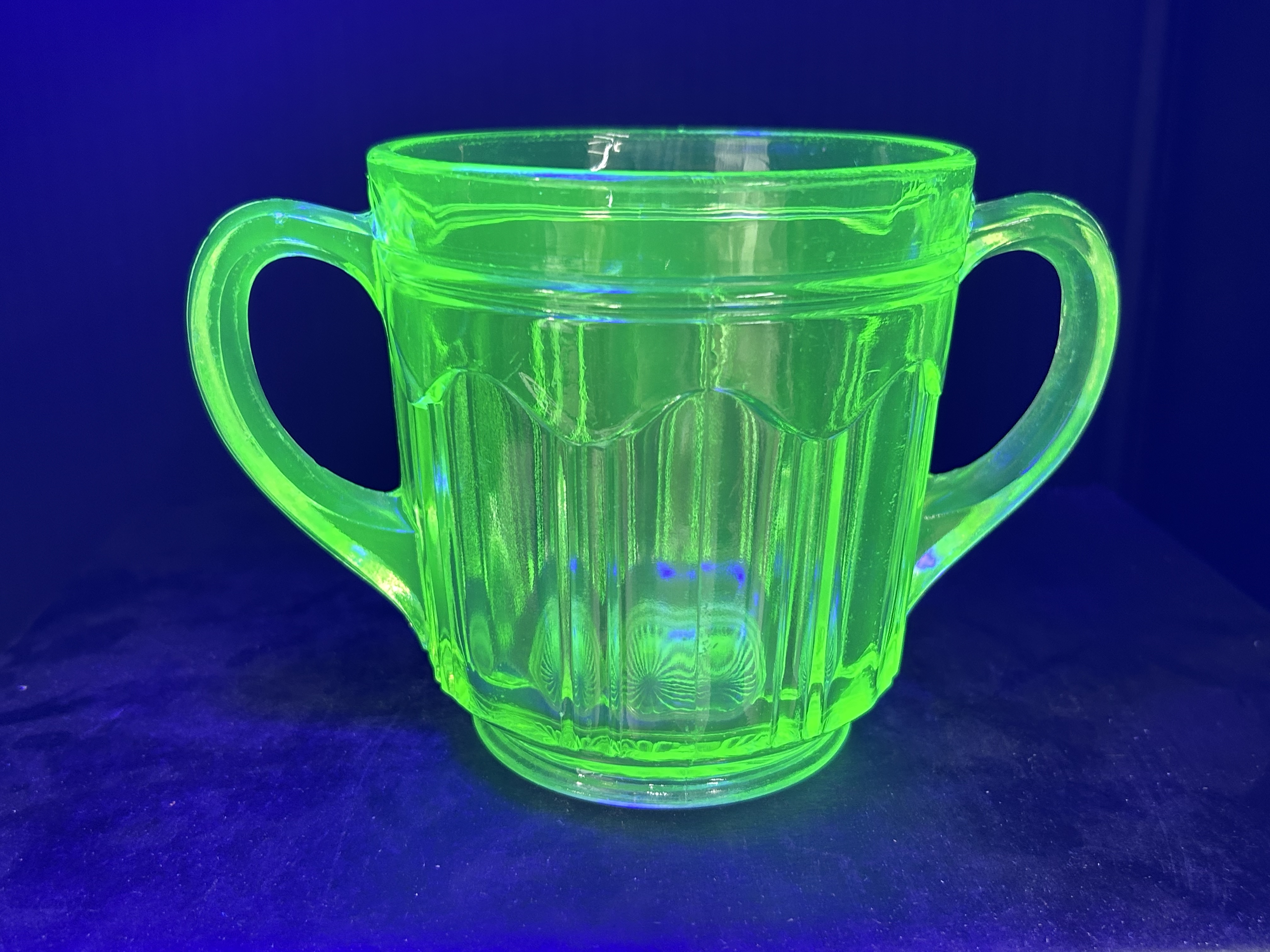 TWO ITEMS OF GREEN DEPRESSION GLASS, CIRCA 1930