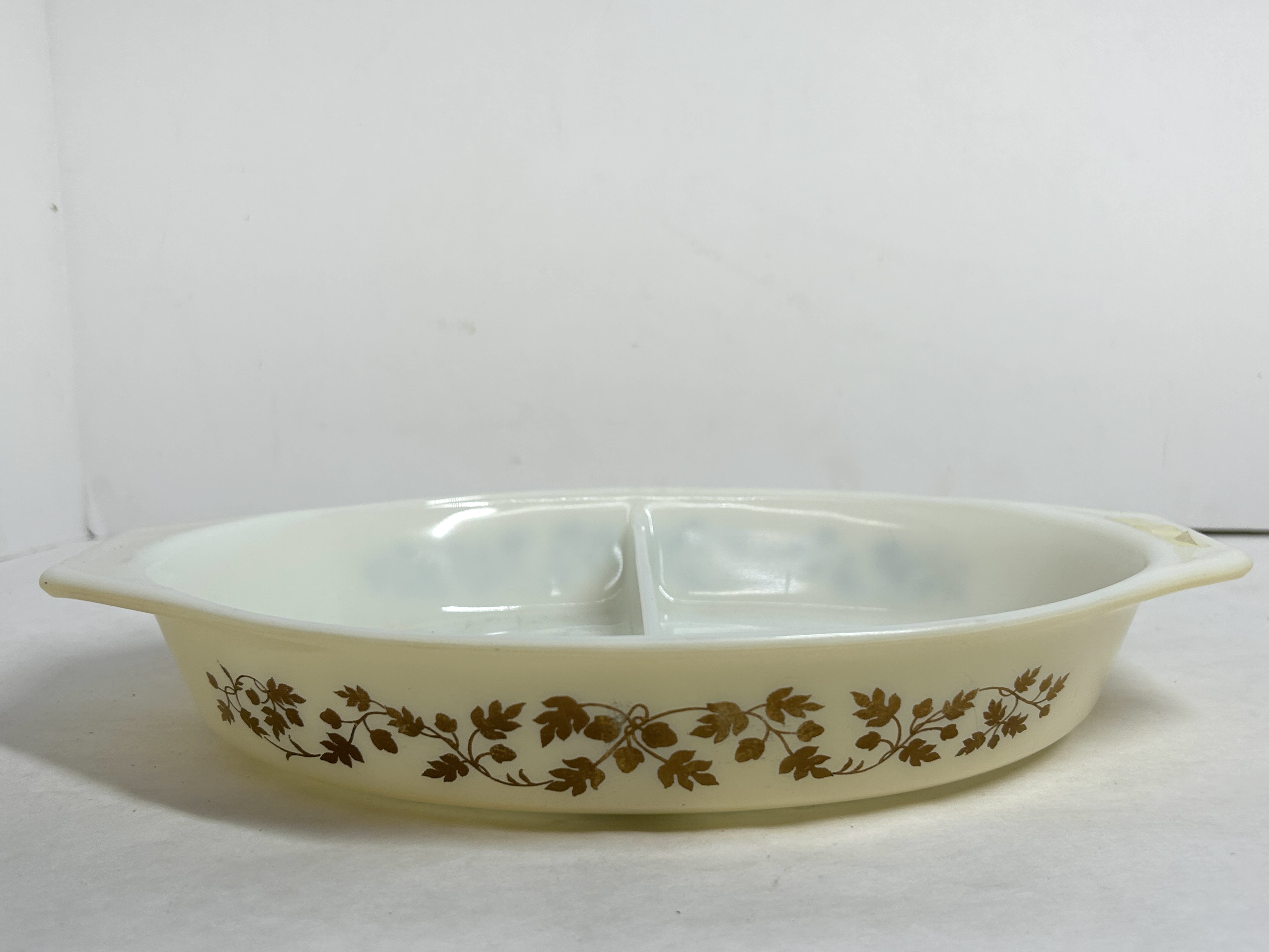 PYREX GOLD ACORN MILK GLASS CASSEROLE, CIRCA 1960