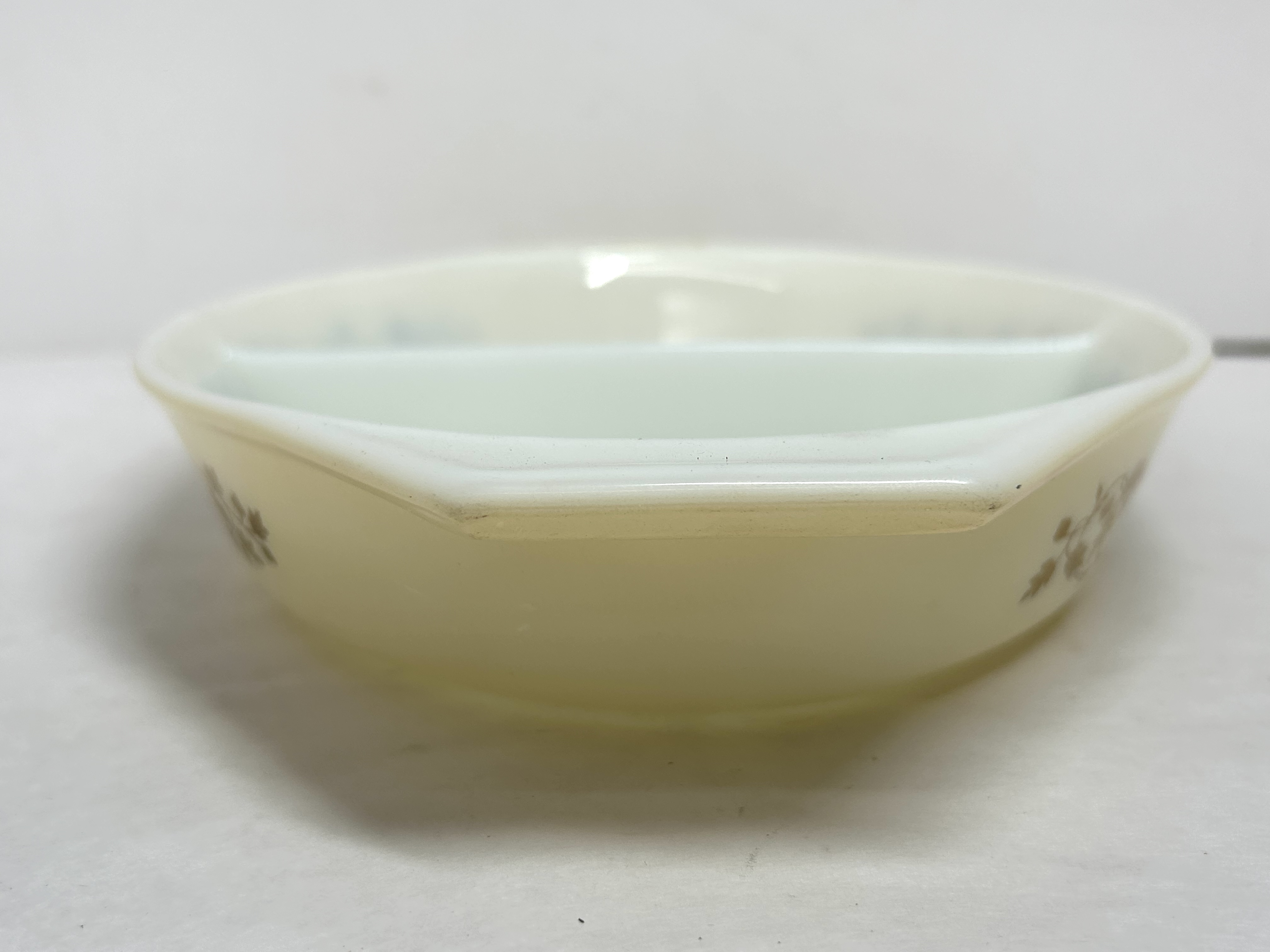 PYREX GOLD ACORN MILK GLASS CASSEROLE, CIRCA 1960