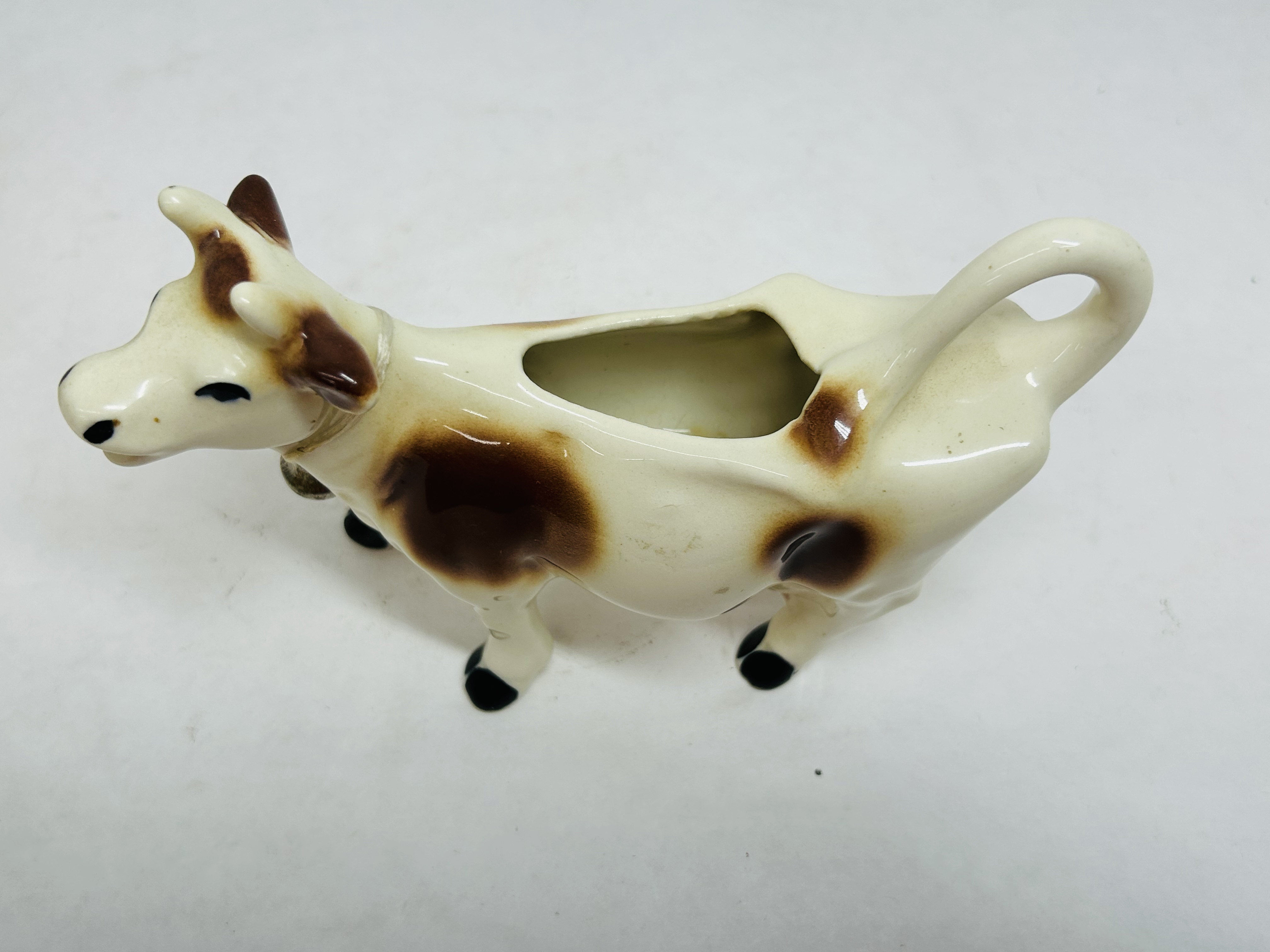 CERAMIC COW CREAMER PAIR, MID-20TH CENTURY