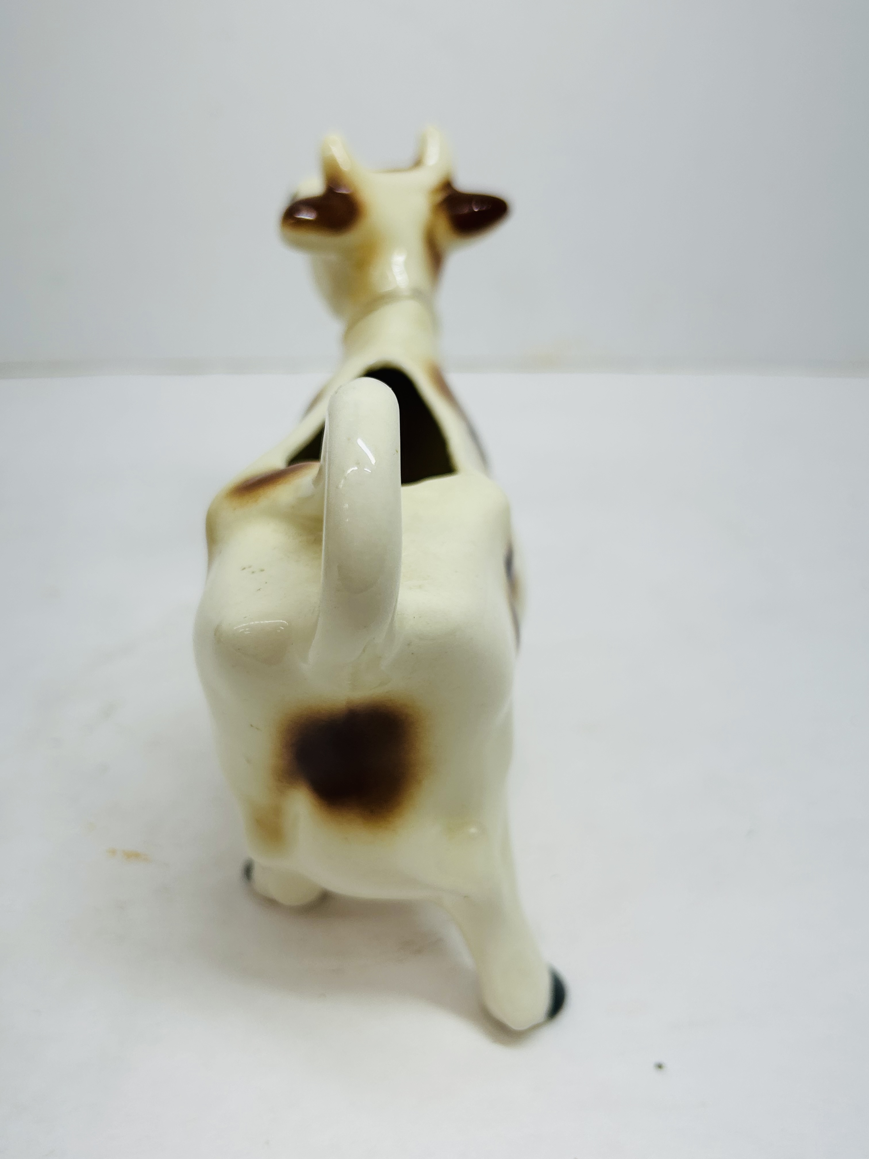 CERAMIC COW CREAMER PAIR, MID-20TH CENTURY