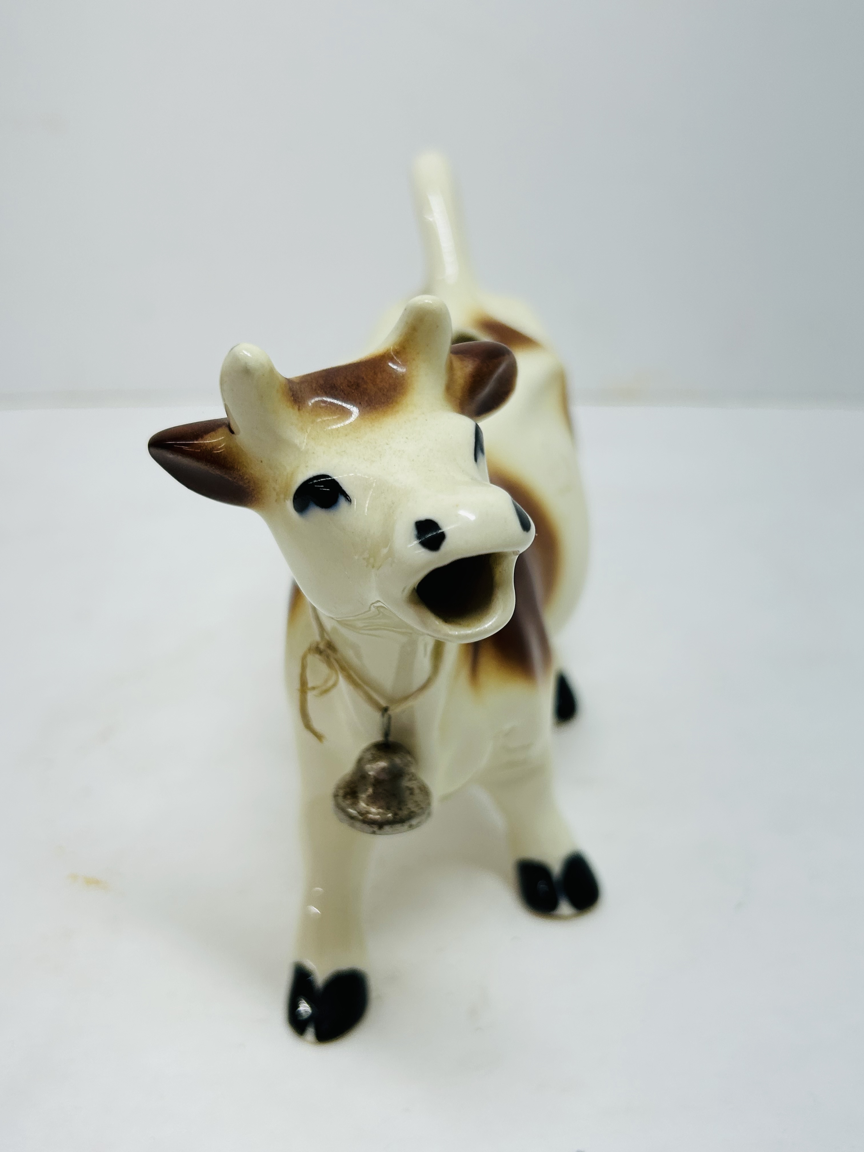 CERAMIC COW CREAMER PAIR, MID-20TH CENTURY