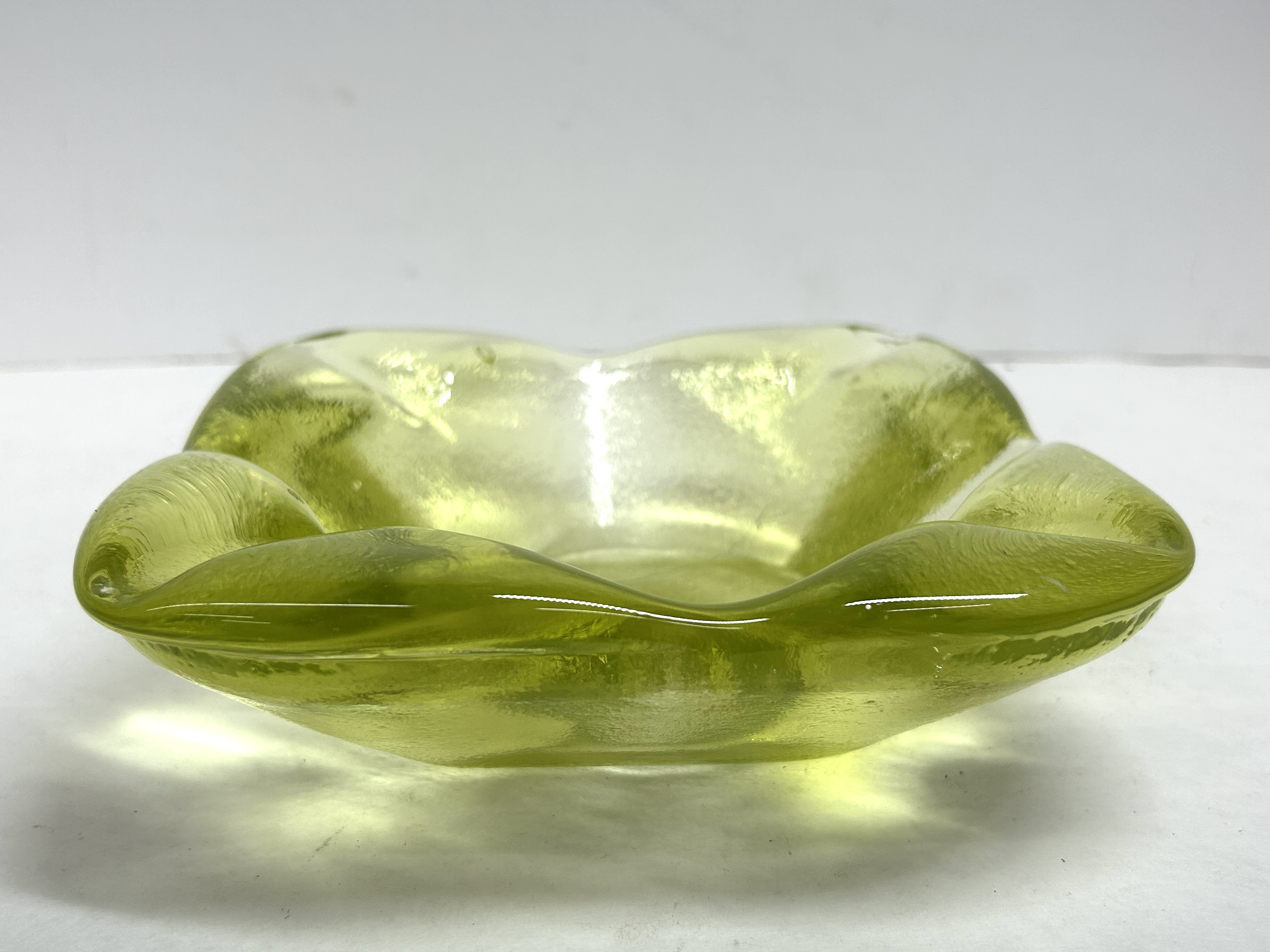 MID-CENTURY CHARTREUSE GLASS ASHTRAY