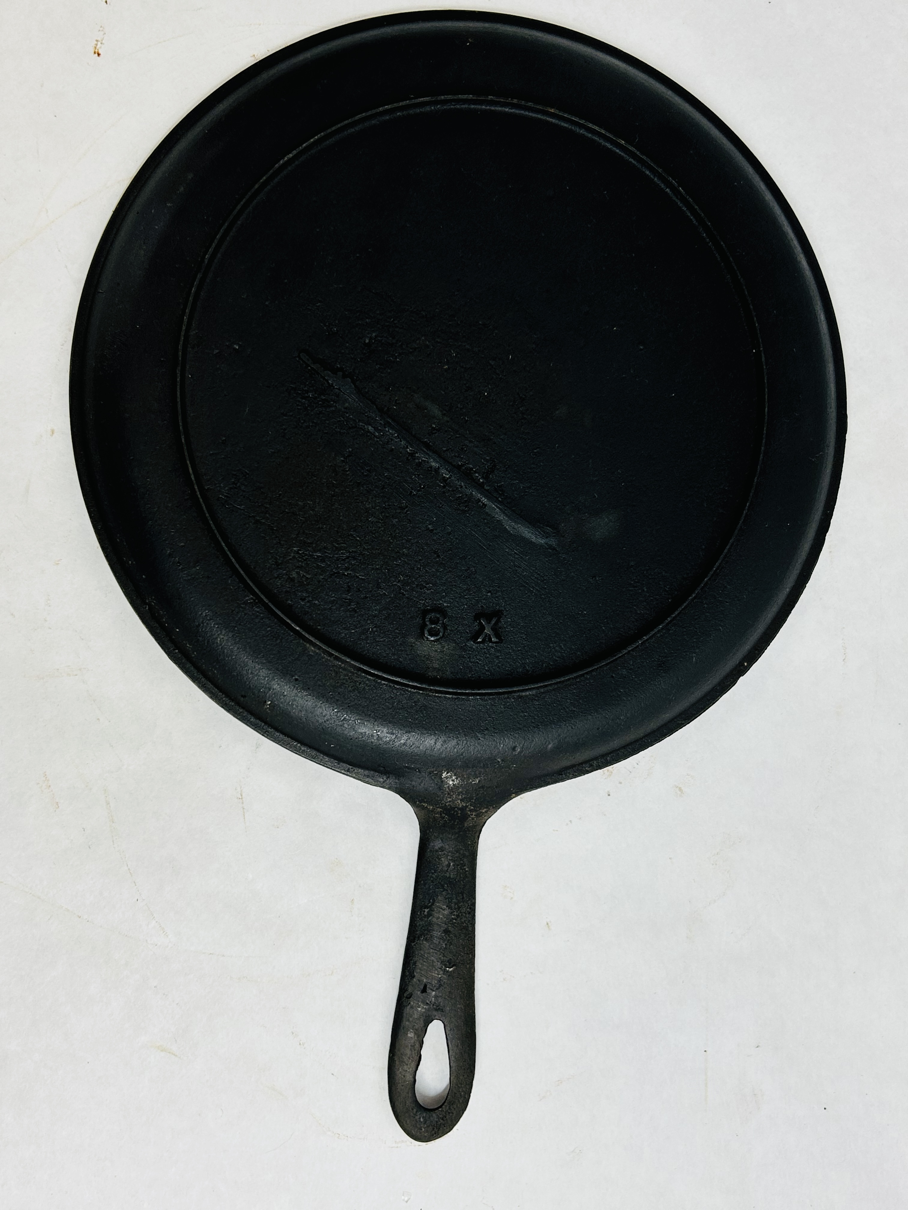 UNMARKED CAST IRON ROUND GRIDDLE, CIRCA 1880