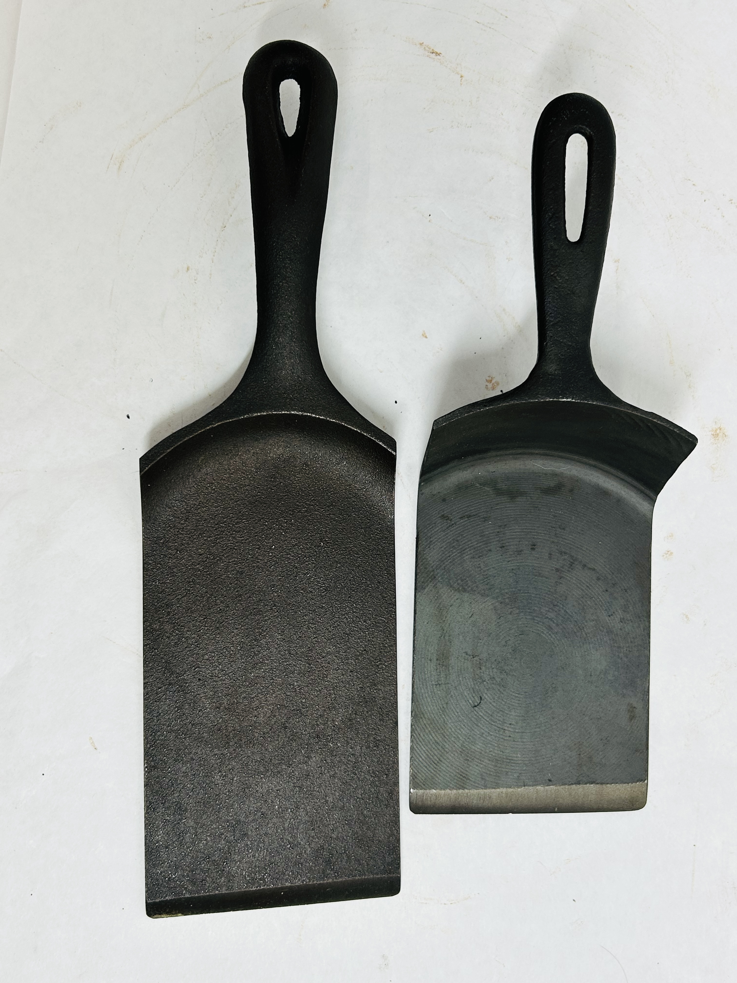 LODGE AND TAIWAN CAST IRON SPATULAS, 20TH CENTURY