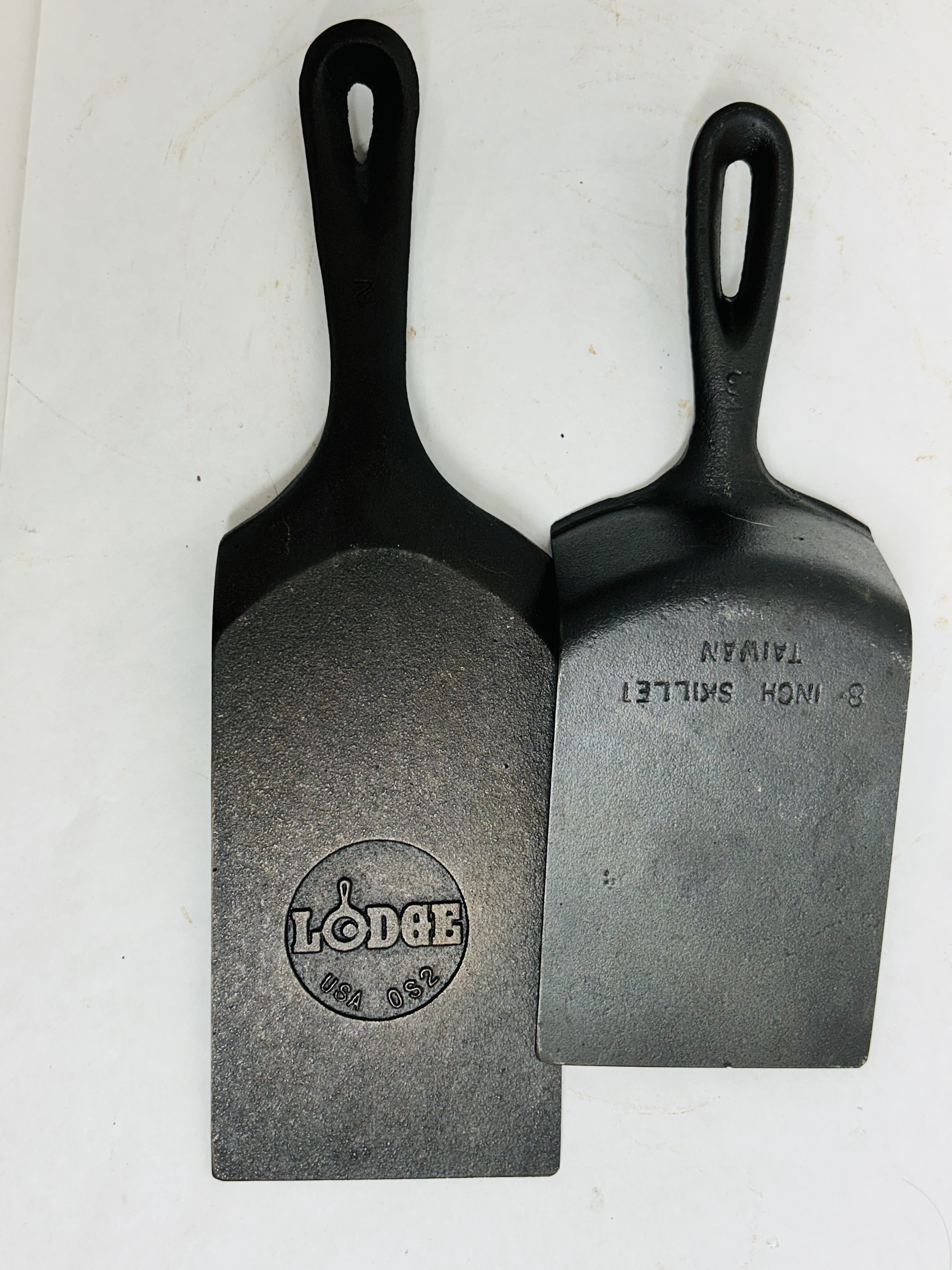 LODGE AND TAIWAN CAST IRON SPATULAS, 20TH CENTURY