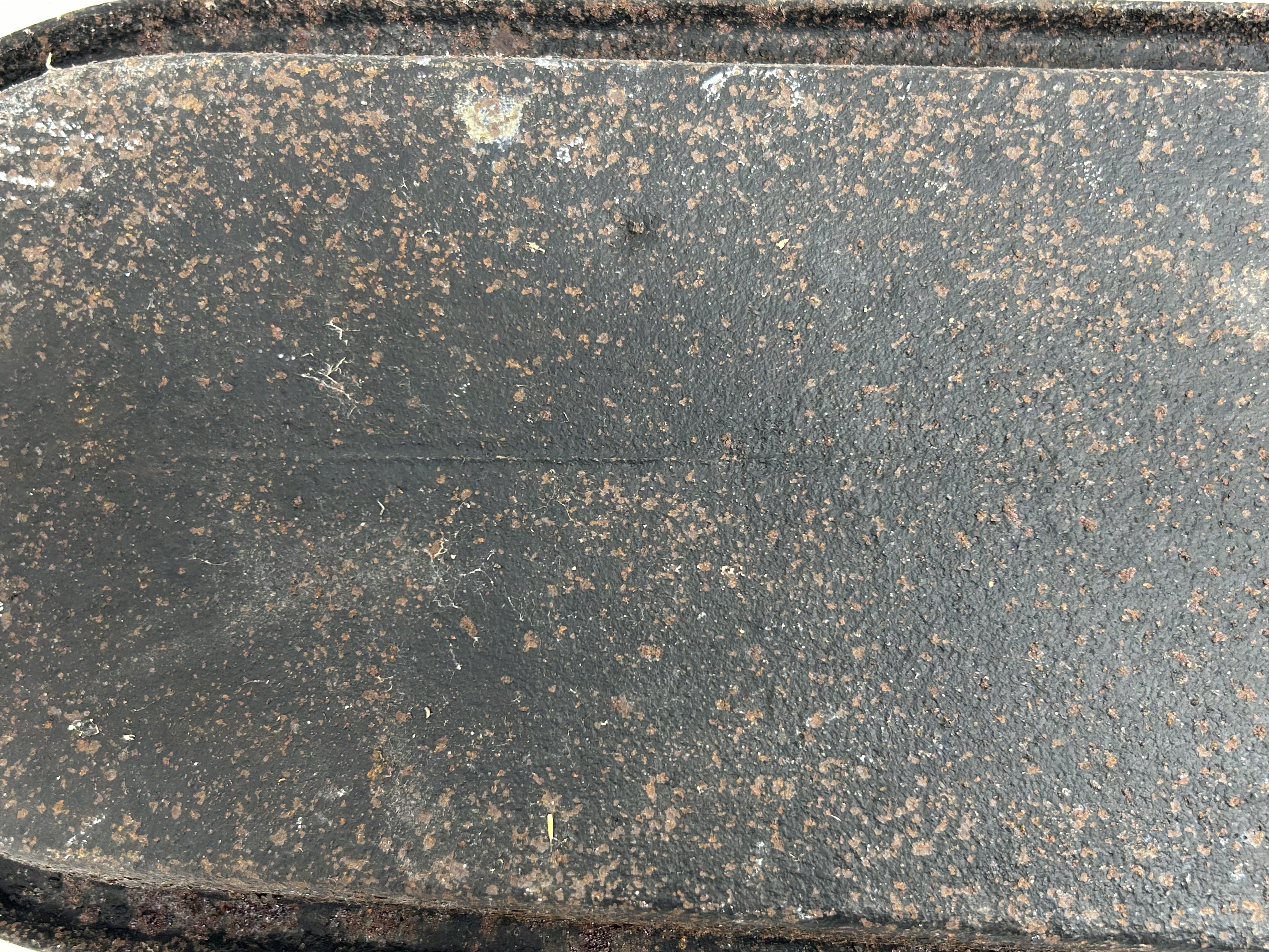 CAST IRON OVAL GRIDDLE, 19TH CENTURY