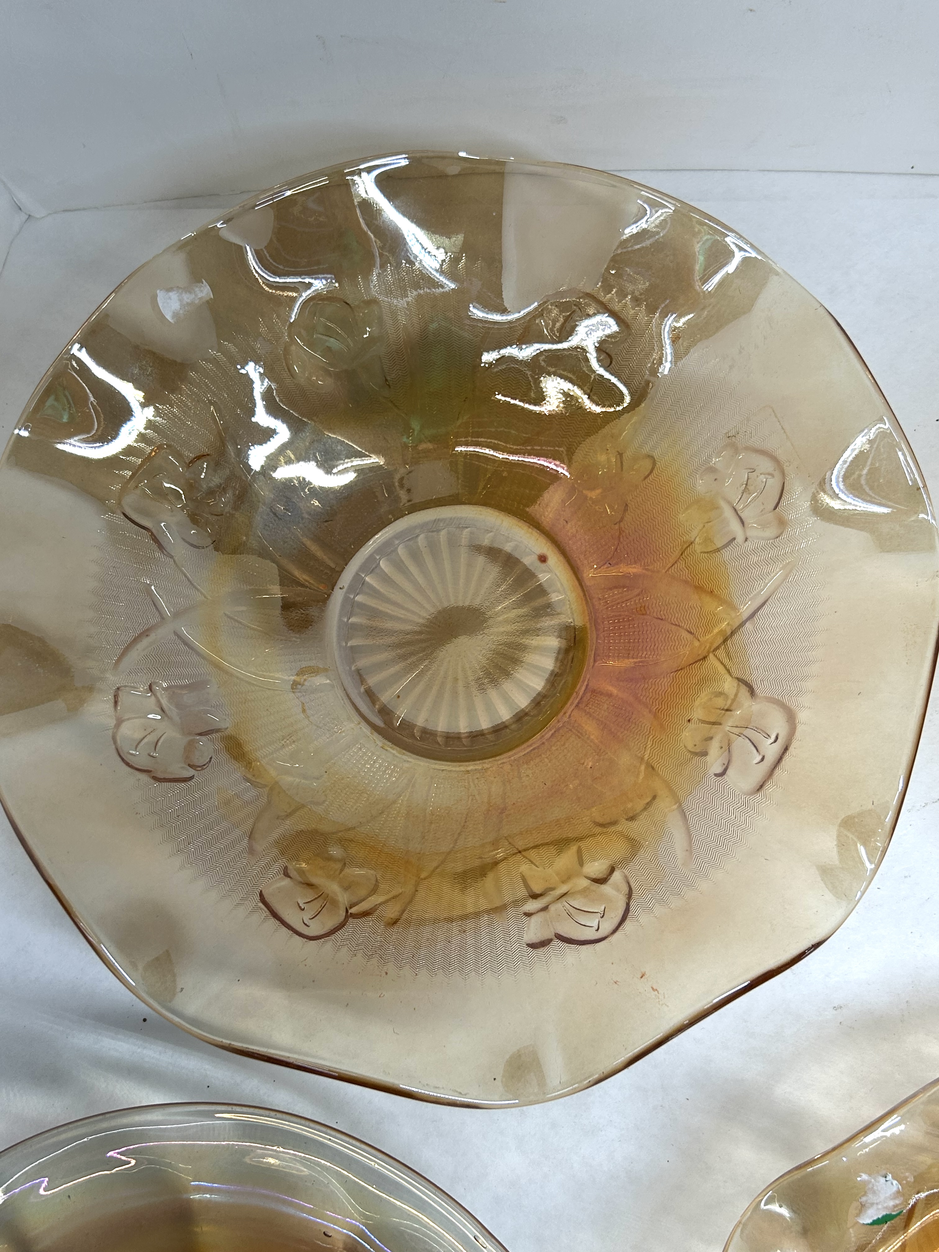 FIVE MARIGOLD IRIDESCENT GLASS BOWLS, C. 1930-1950
