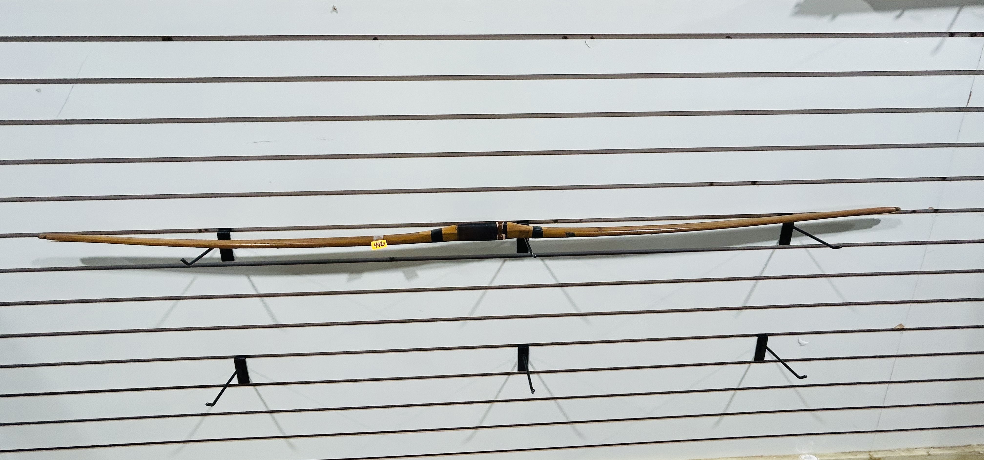 VINTAGE WOODEN LONGBOW, MID-20TH CENTURY