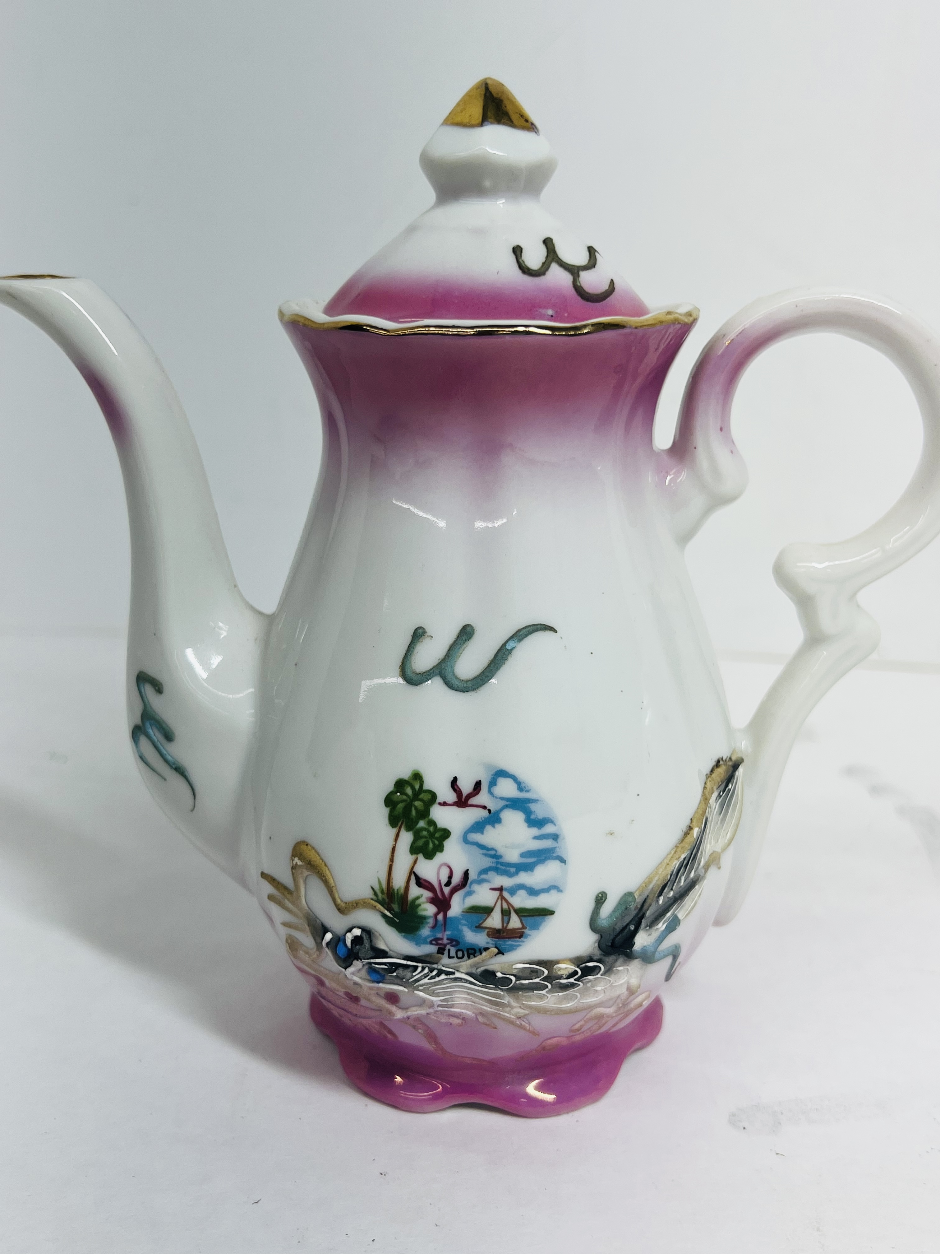 TRIO OF VINTAGE PORCELAIN TEAPOTS