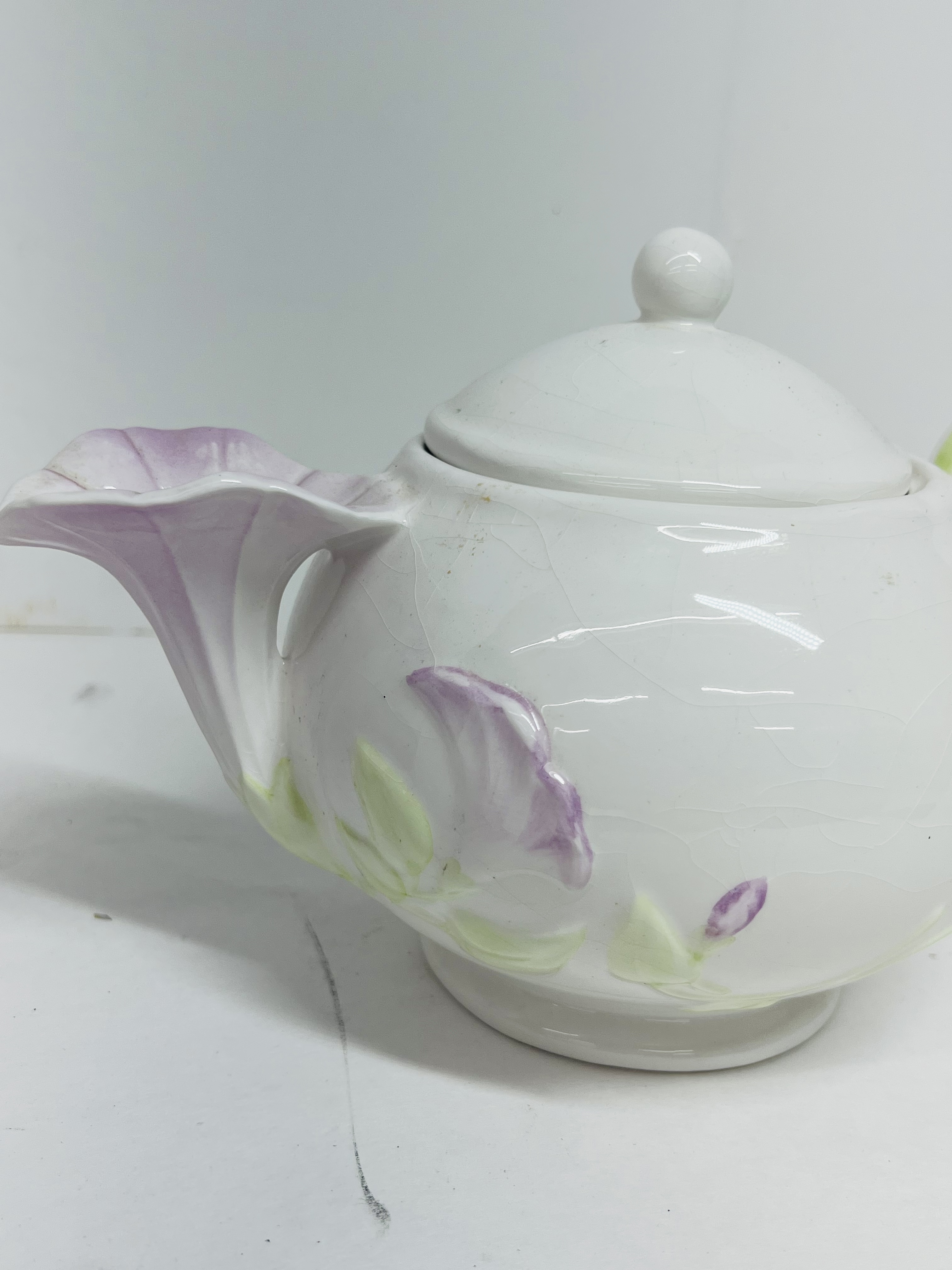 TRIO OF VINTAGE PORCELAIN TEAPOTS