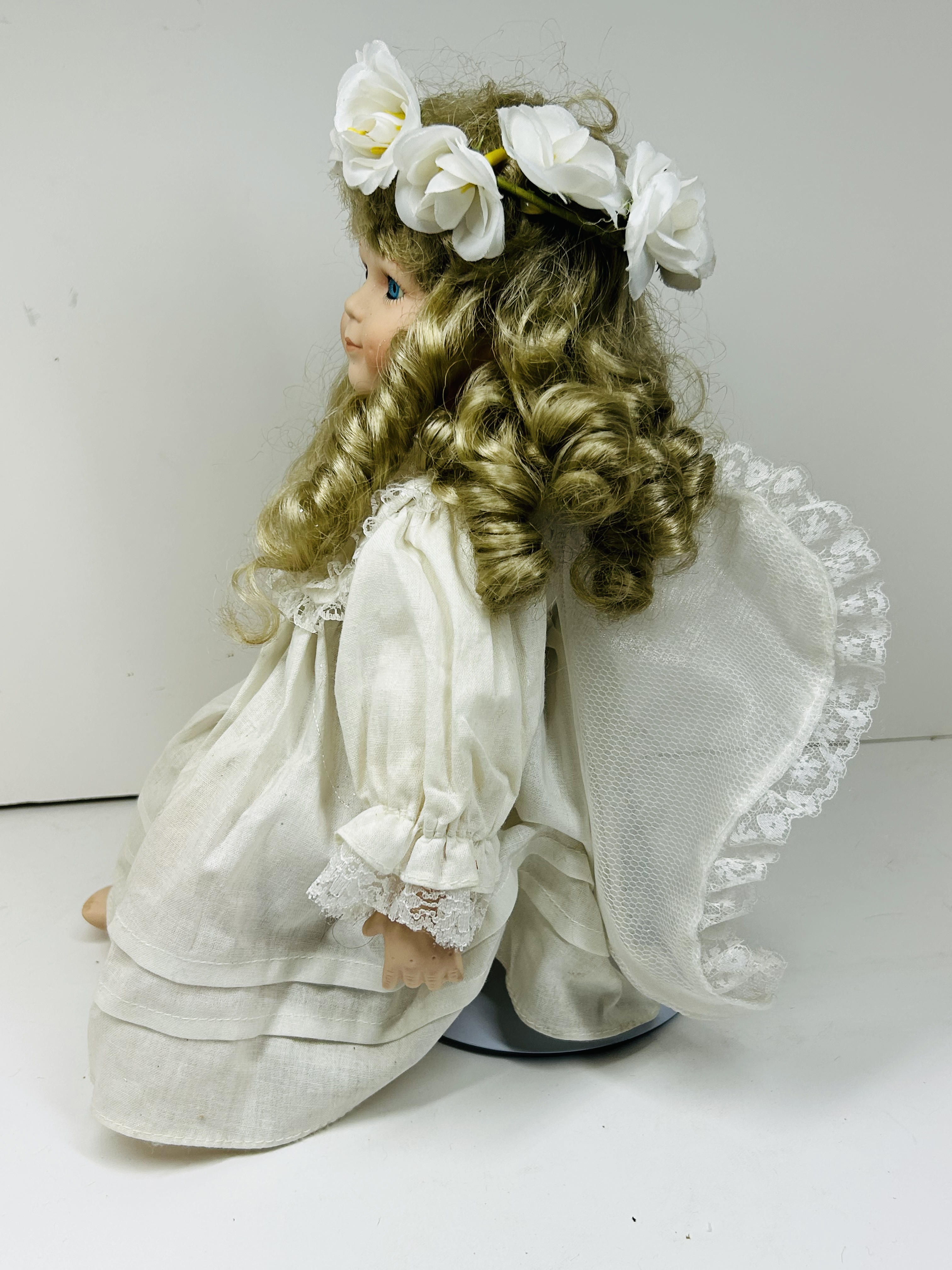COLLECTIBLE PORCELAIN ANGEL DOLL, LATE 20TH CENTURY