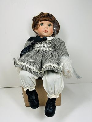 DANBURY MINT "HALEY" PORCELAIN DOLL, 1990S. A Danbury Mint porcelain collector doll titled Haley 