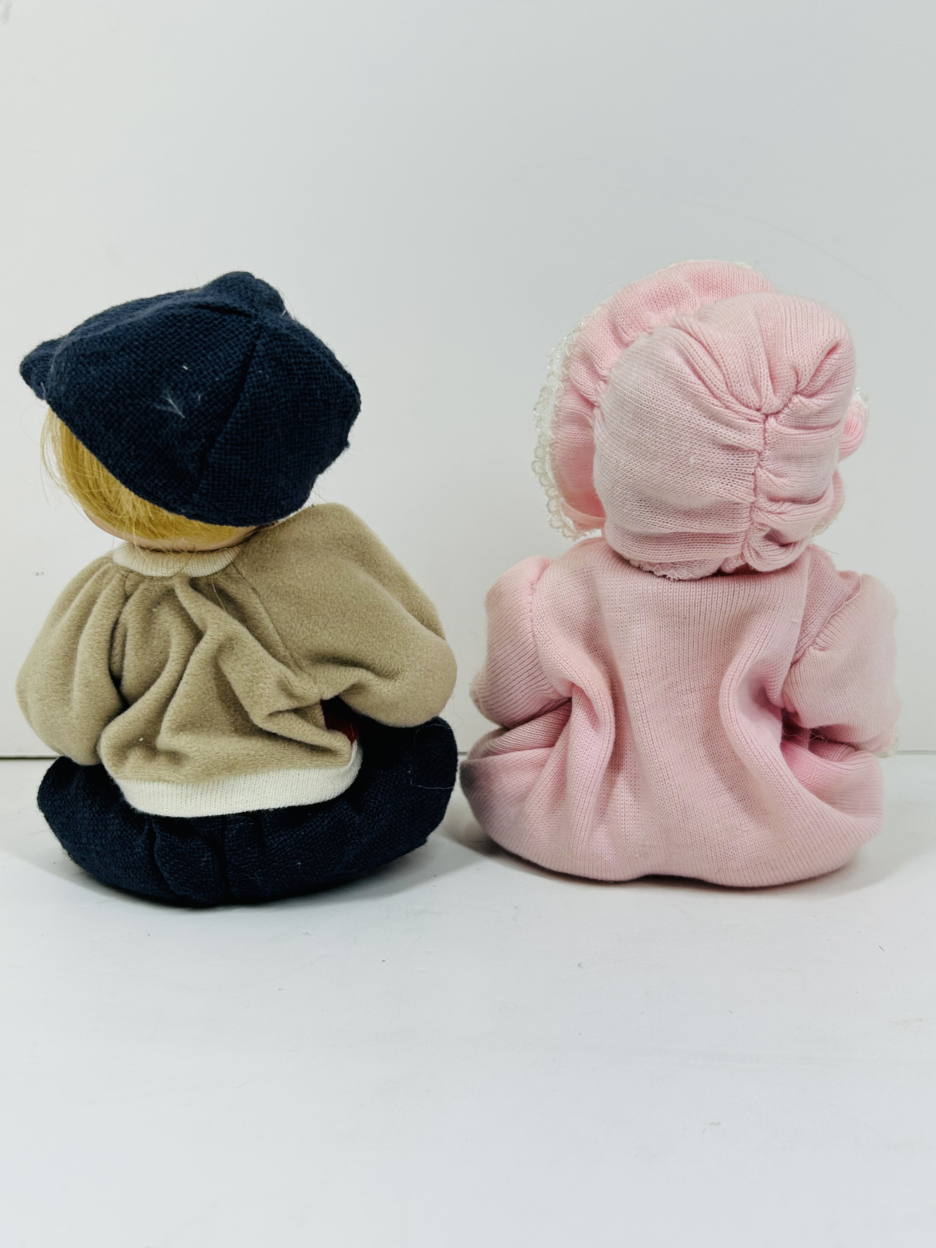 PAIR OF THEMED BISQUE DOLLS