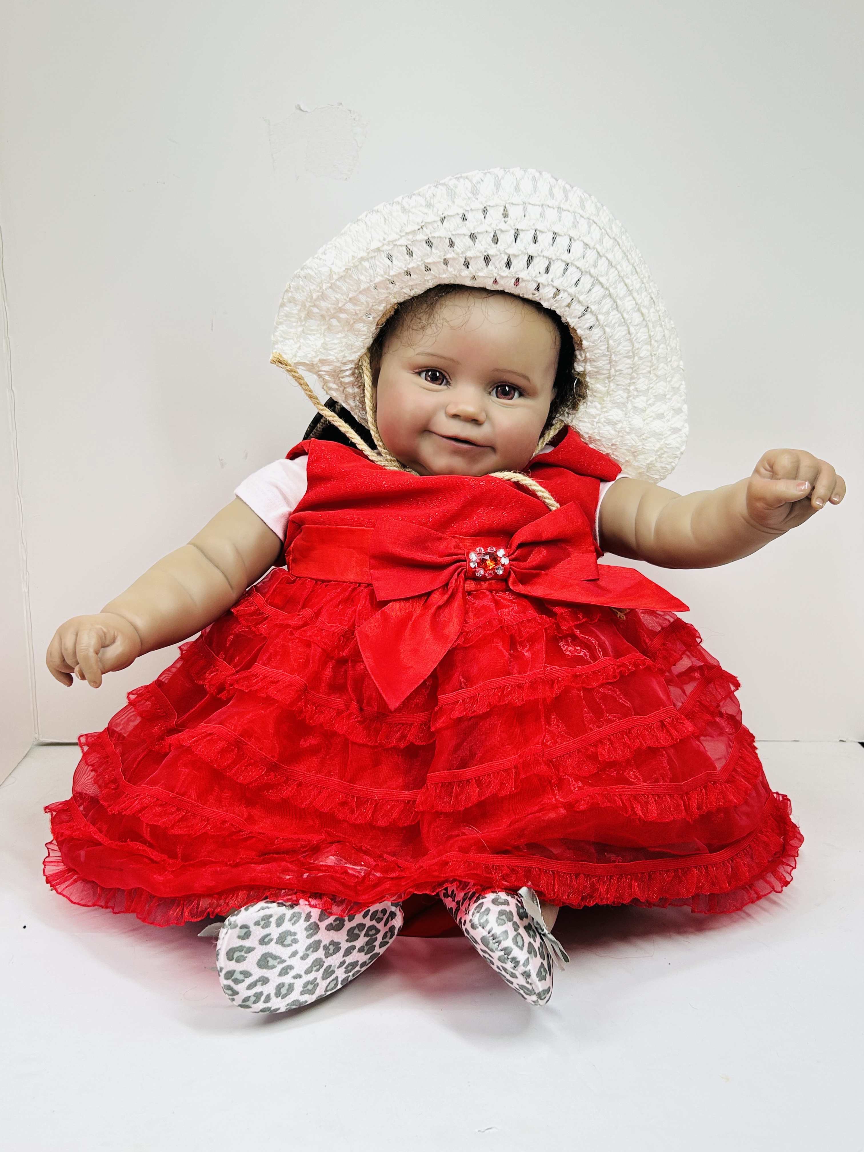 REBORN TODDLER DOLL IN RED DRESS