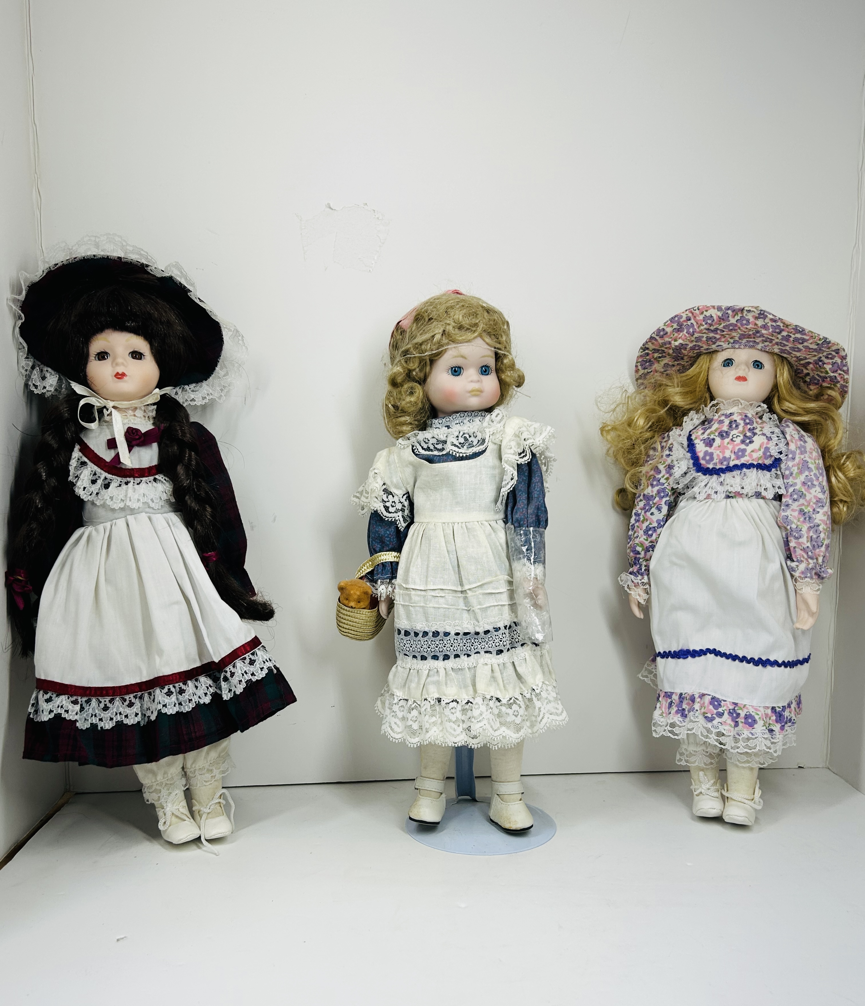 TRIO OF PORCELAIN DOLLS, 1990S