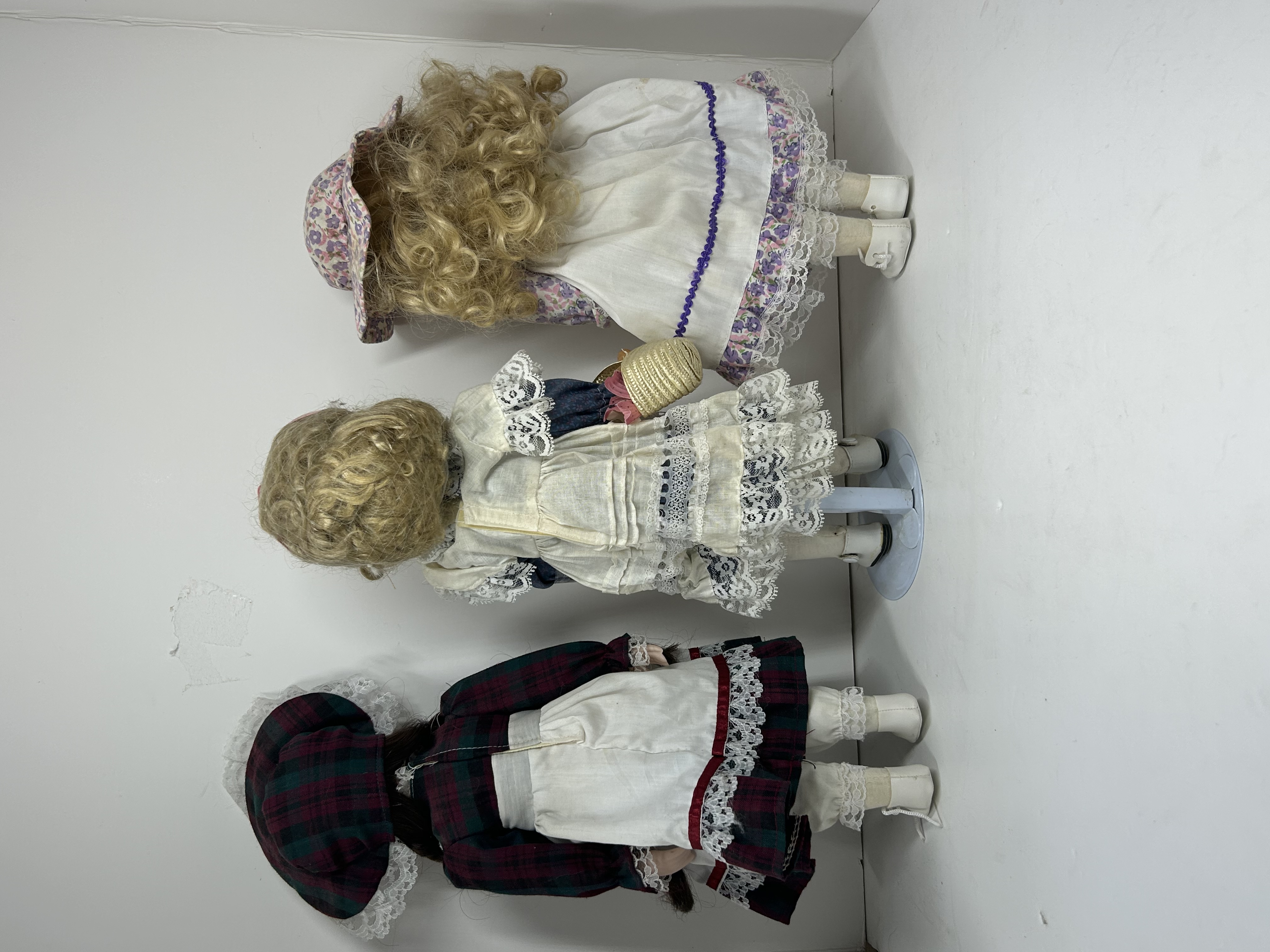 TRIO OF PORCELAIN DOLLS, 1990S