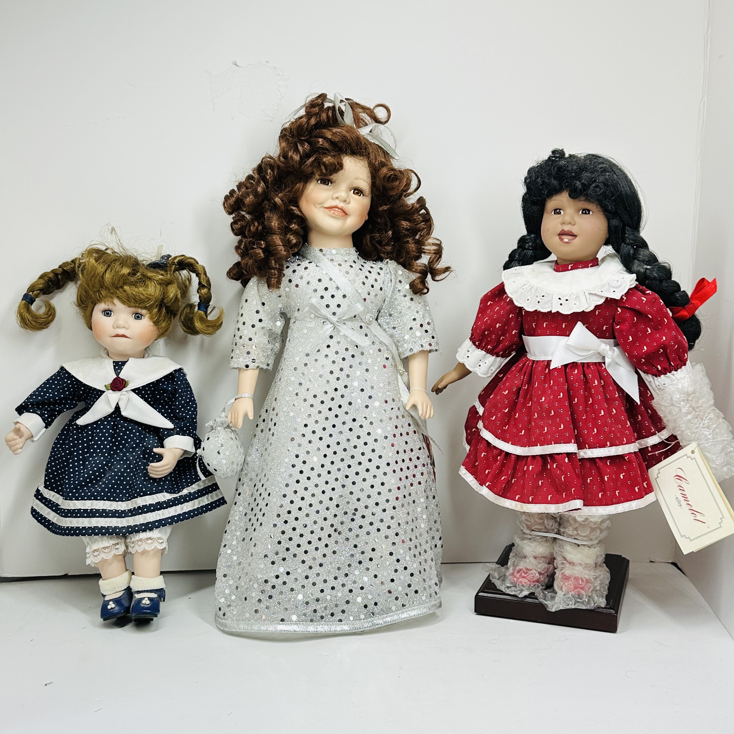 THREE PORCELAIN COLLECTOR DOLLS, 2001
