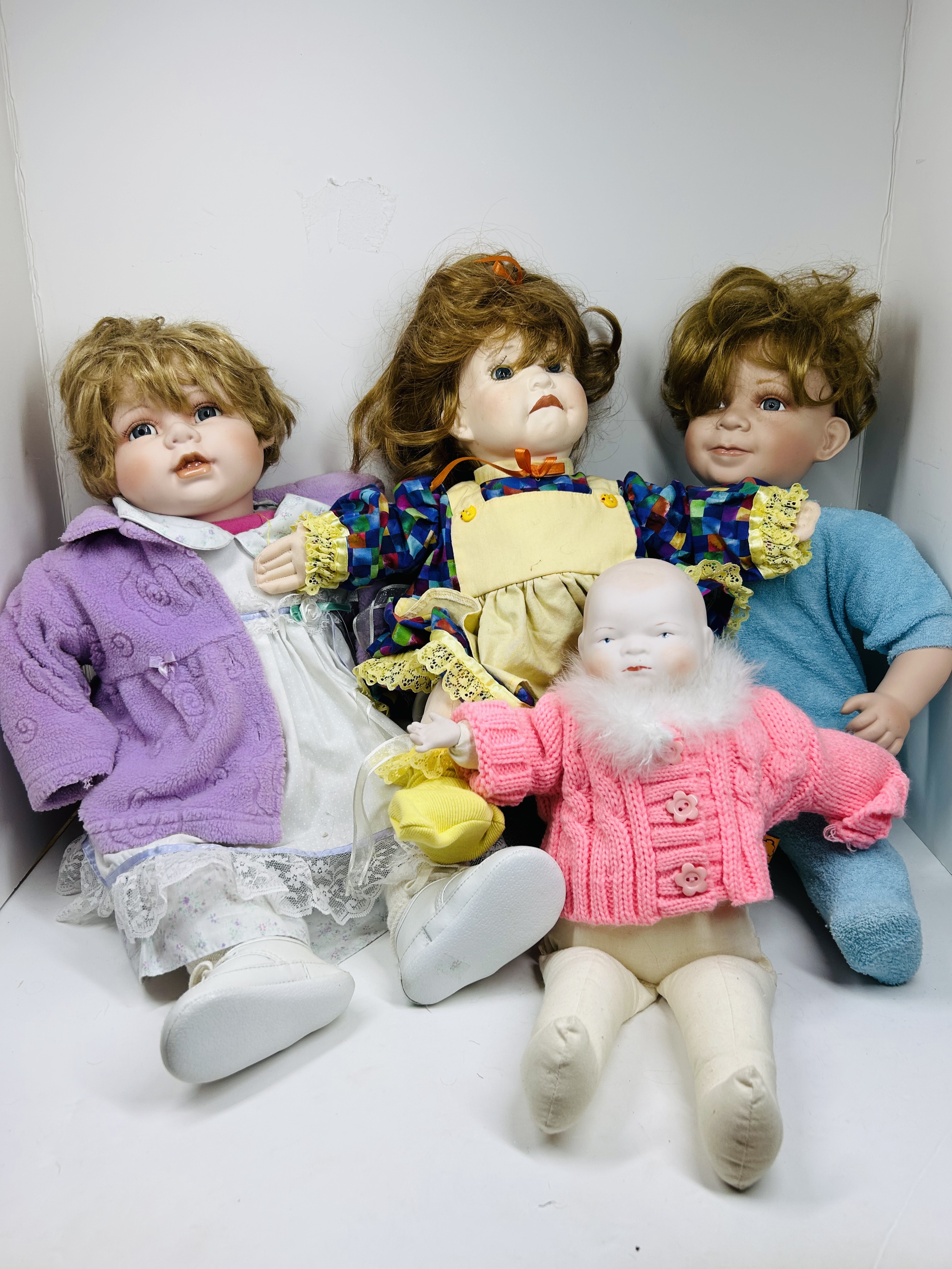 SWAN AND CATHAY PORCELAIN DOLLS, 20TH CENTURY