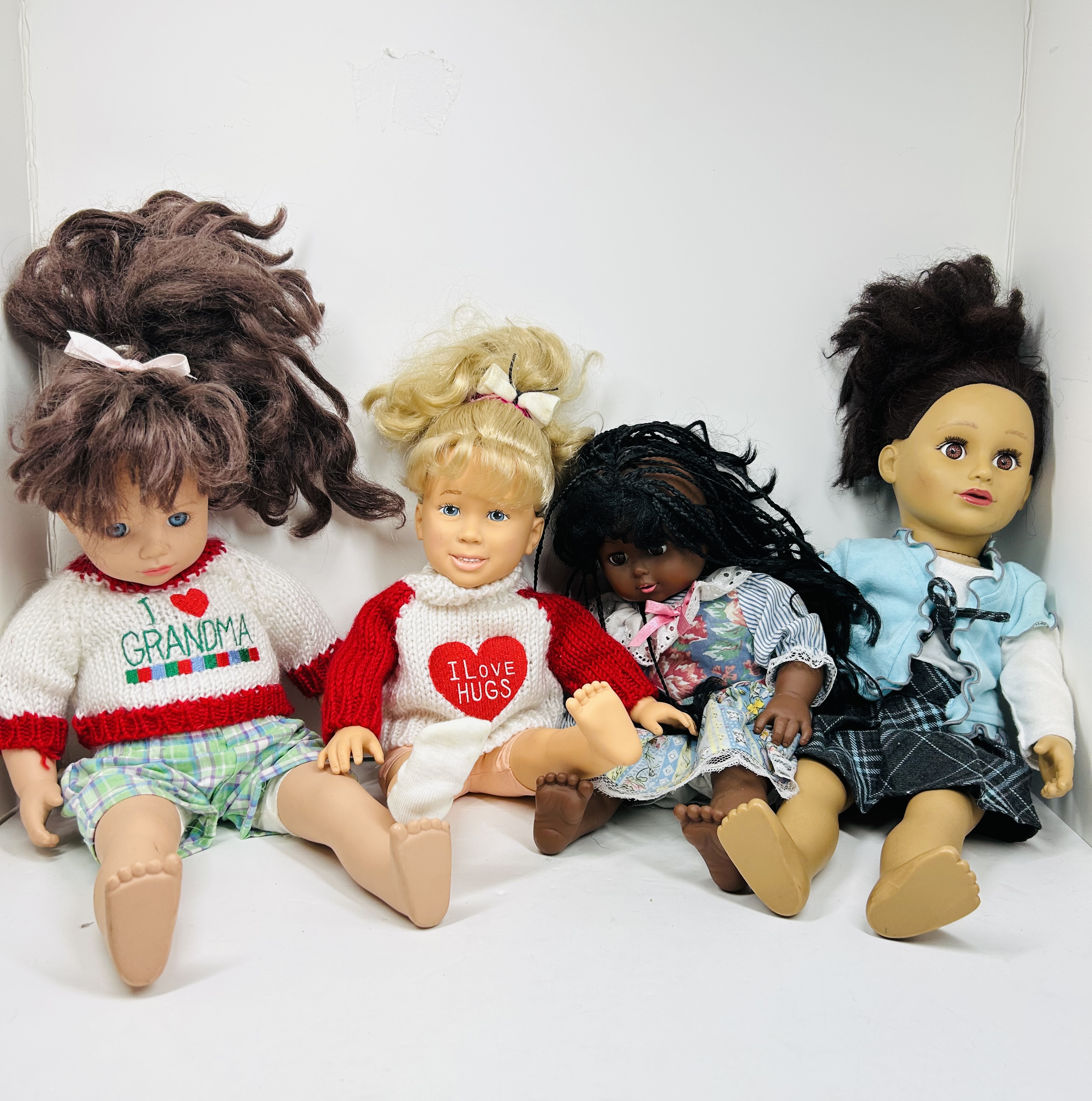 TOLLYTOYS GROUP OF MULTI-ETHNIC PLAY DOLLS