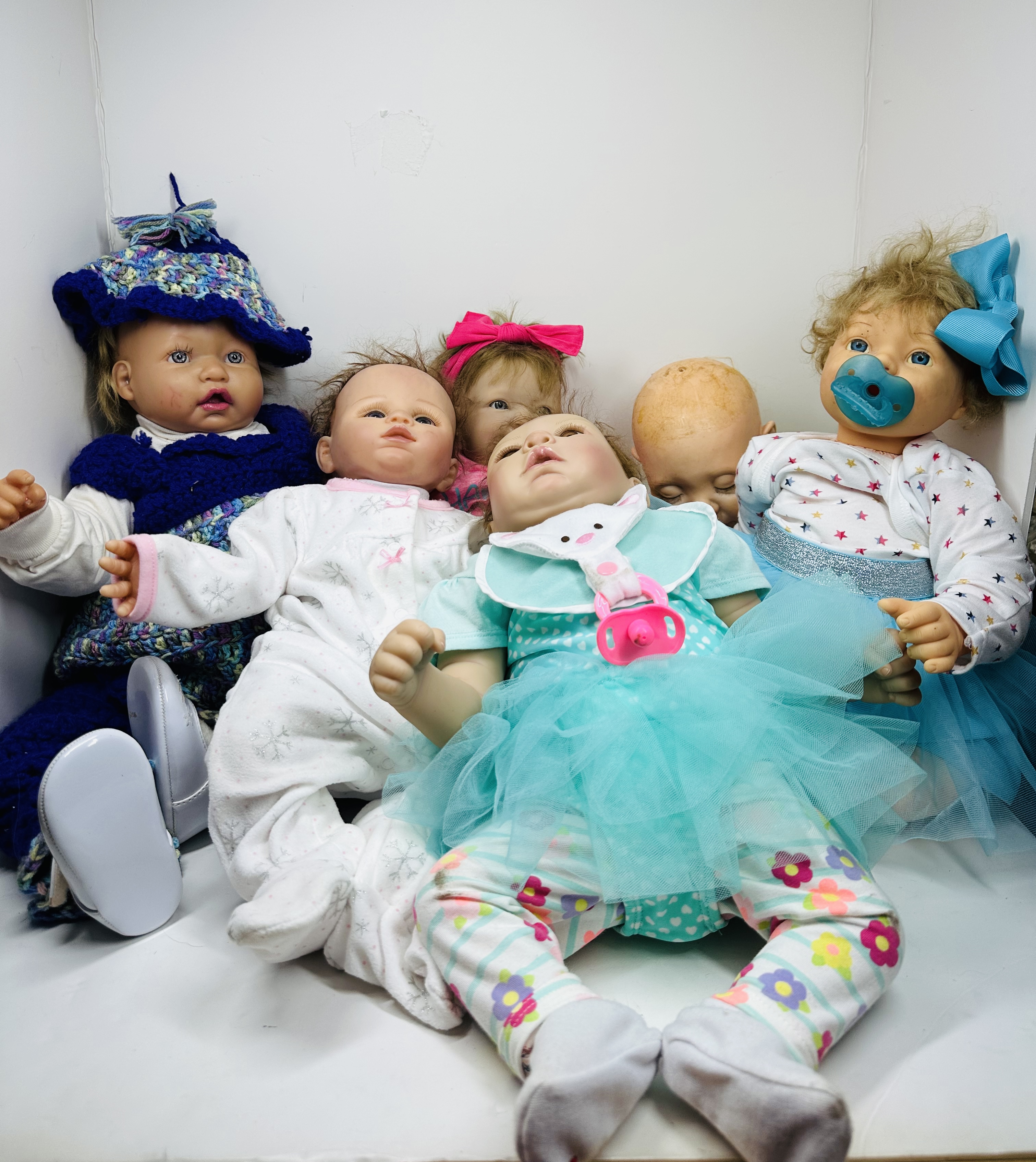 COLLECTION OF REBORN STYLE VINYL DOLLS