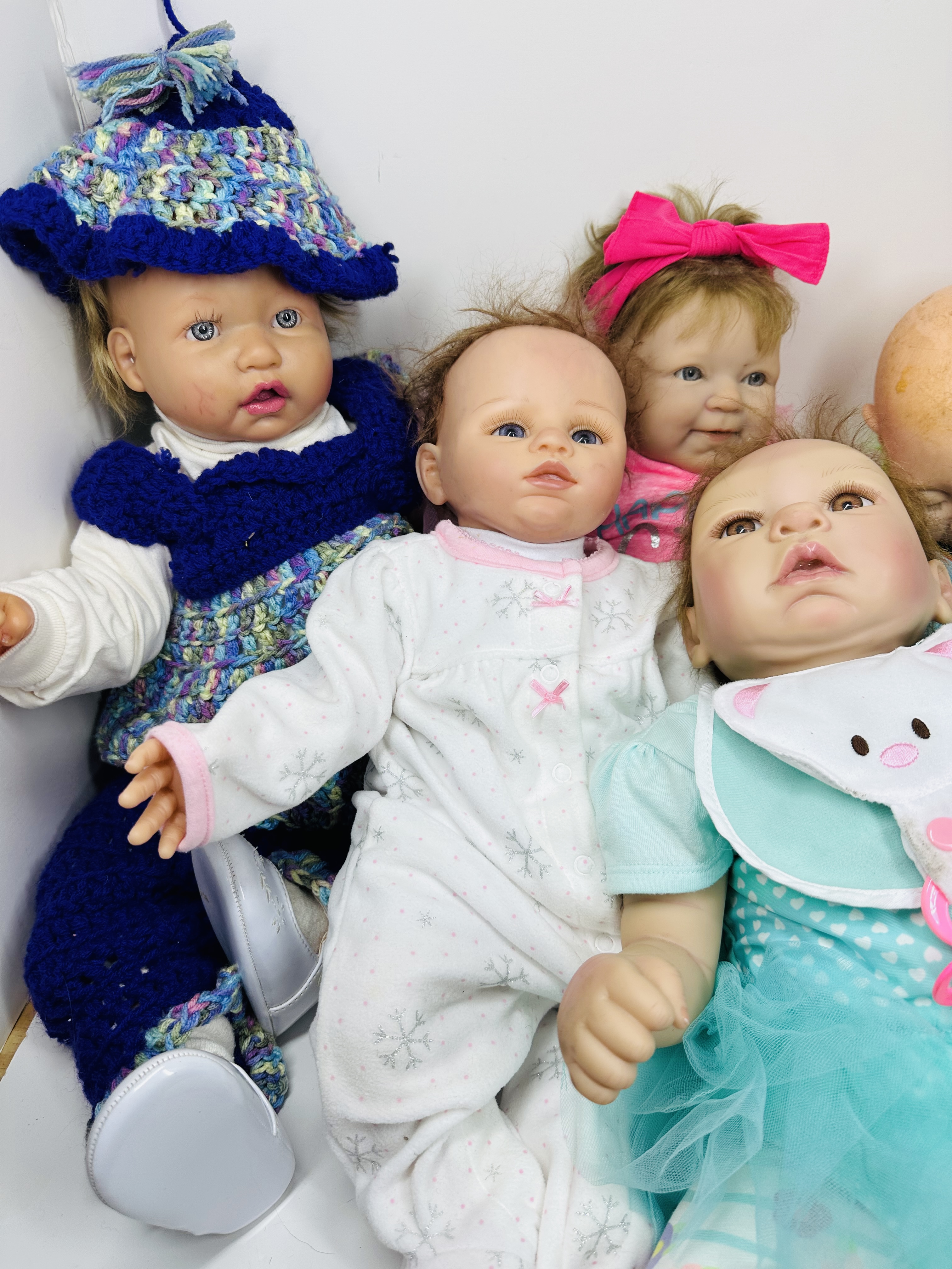 COLLECTION OF REBORN STYLE VINYL DOLLS