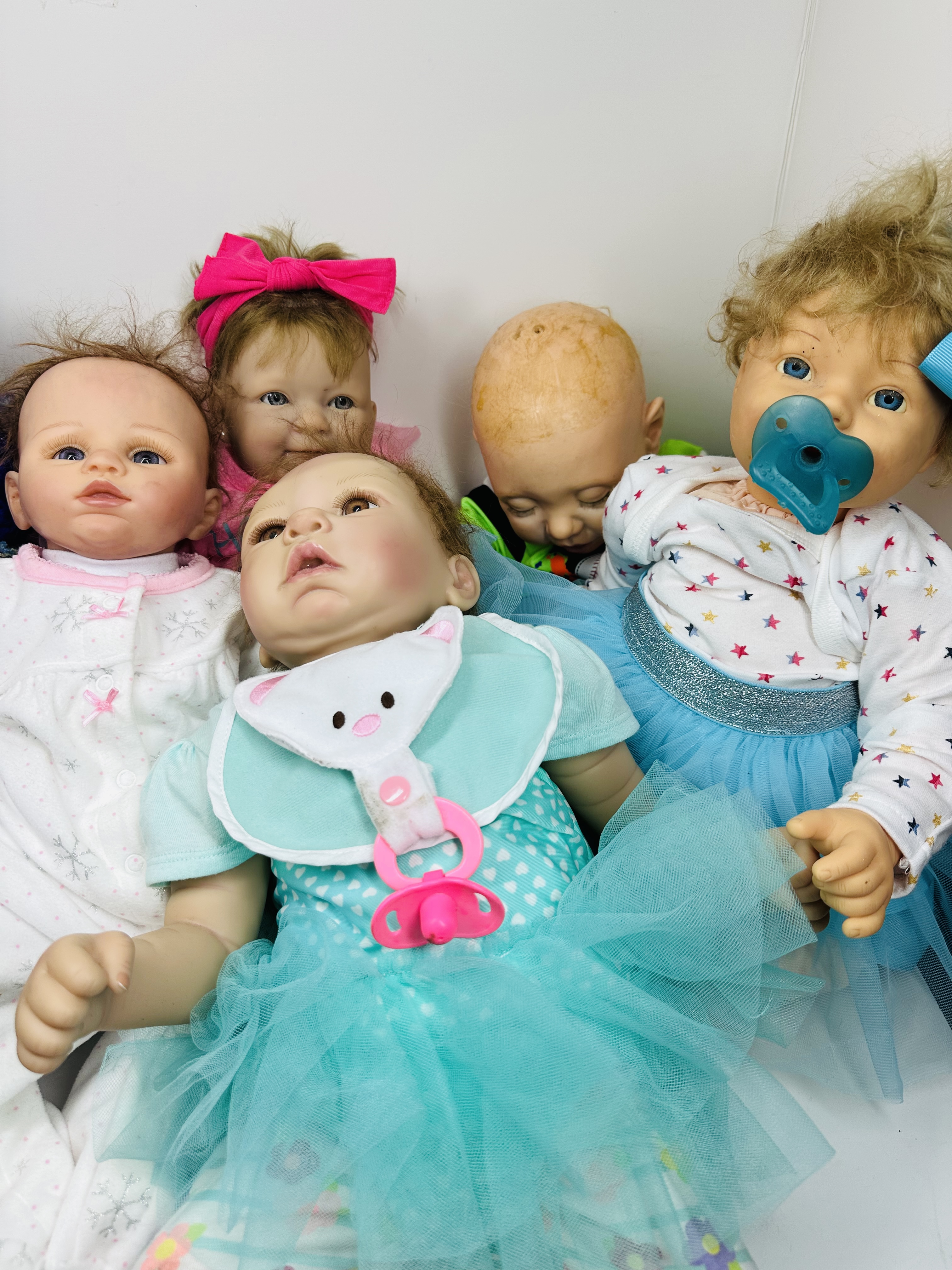 COLLECTION OF REBORN STYLE VINYL DOLLS