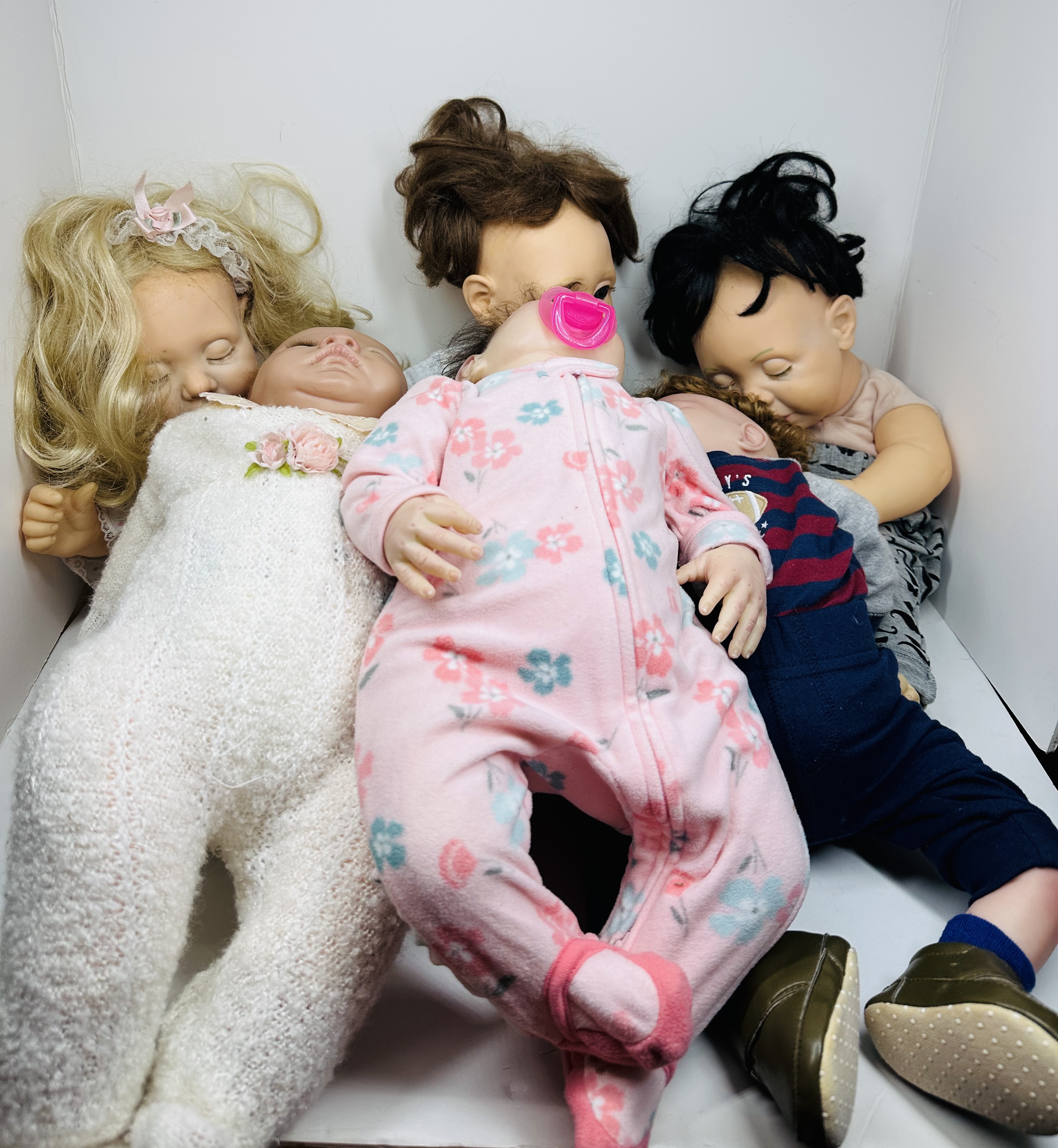 SIX VINYL AND CLOTH BABY DOLLS, MODERN