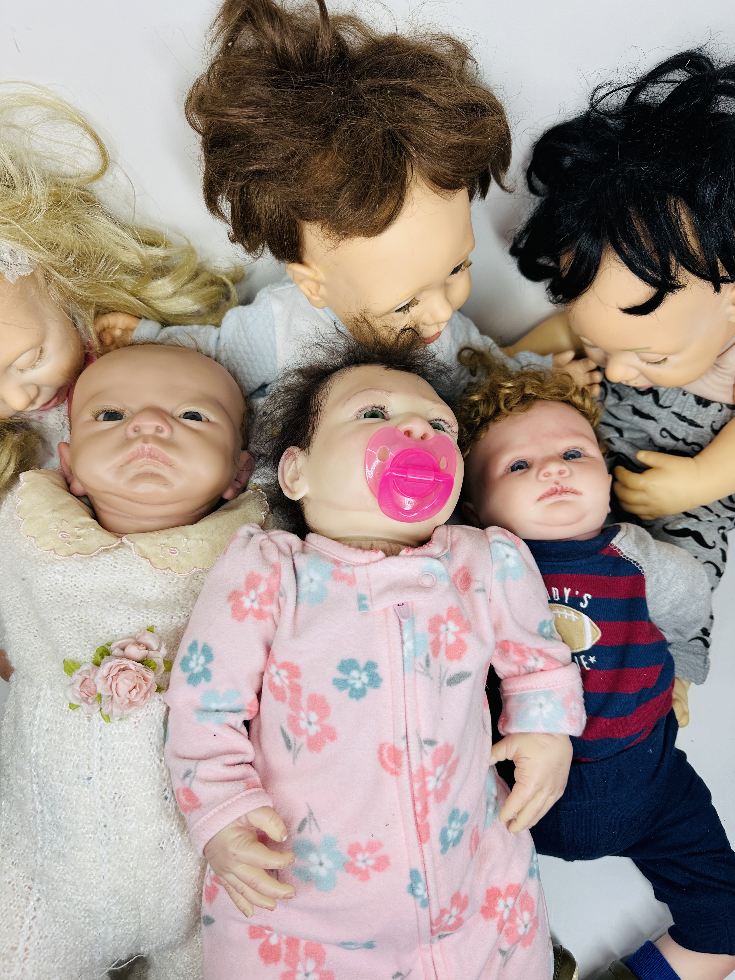 SIX VINYL AND CLOTH BABY DOLLS, MODERN