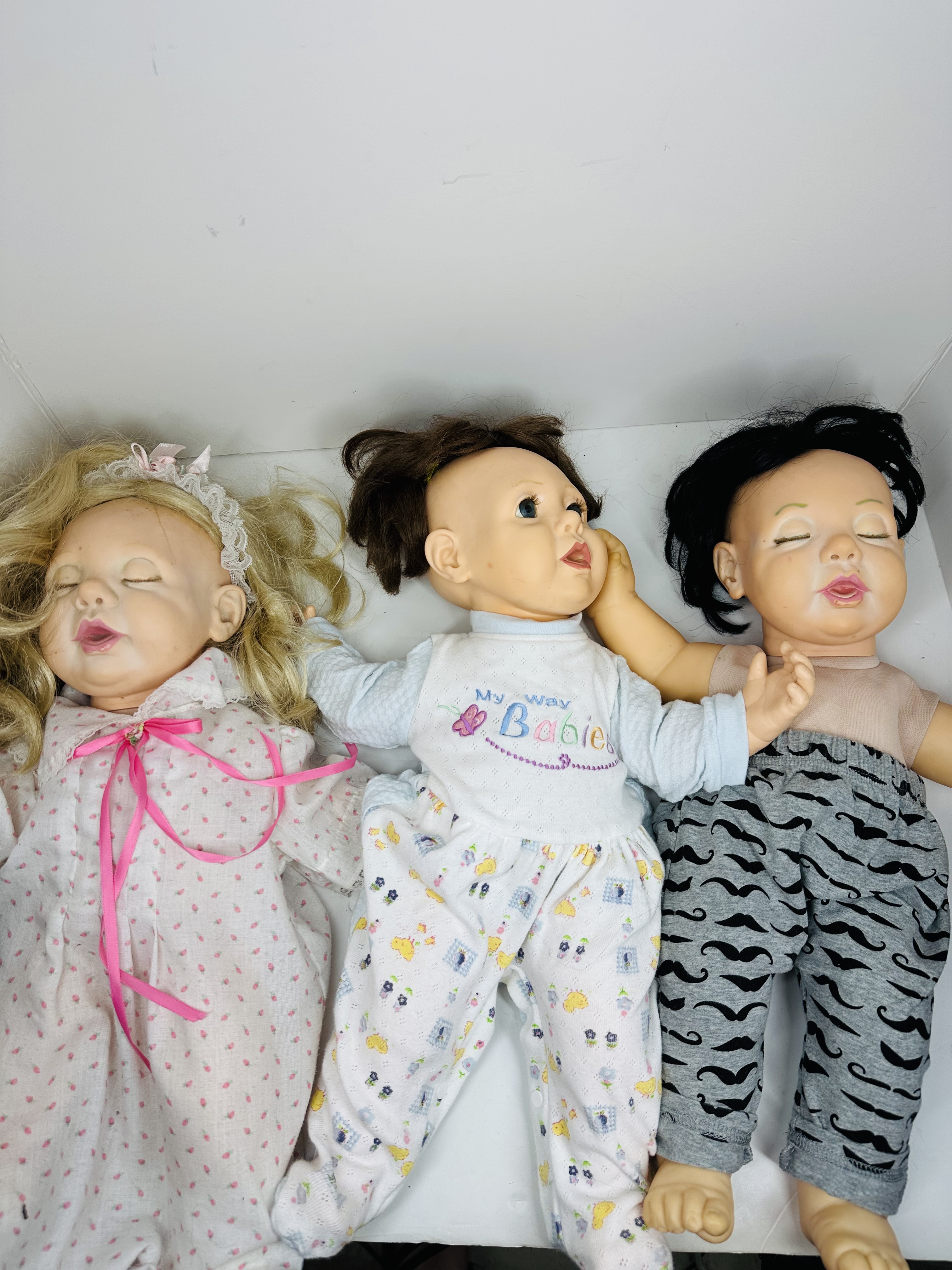 SIX VINYL AND CLOTH BABY DOLLS, MODERN