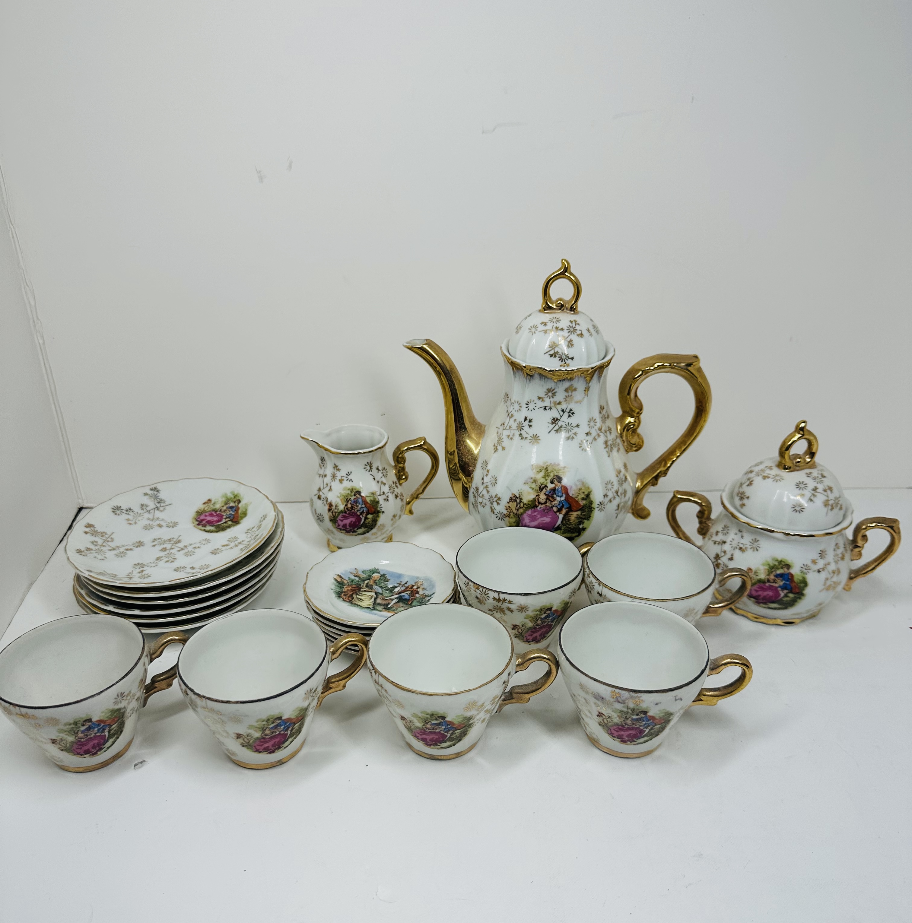 JAPANESE PORCELAIN 21-PIECE TEA SET, C. 1950