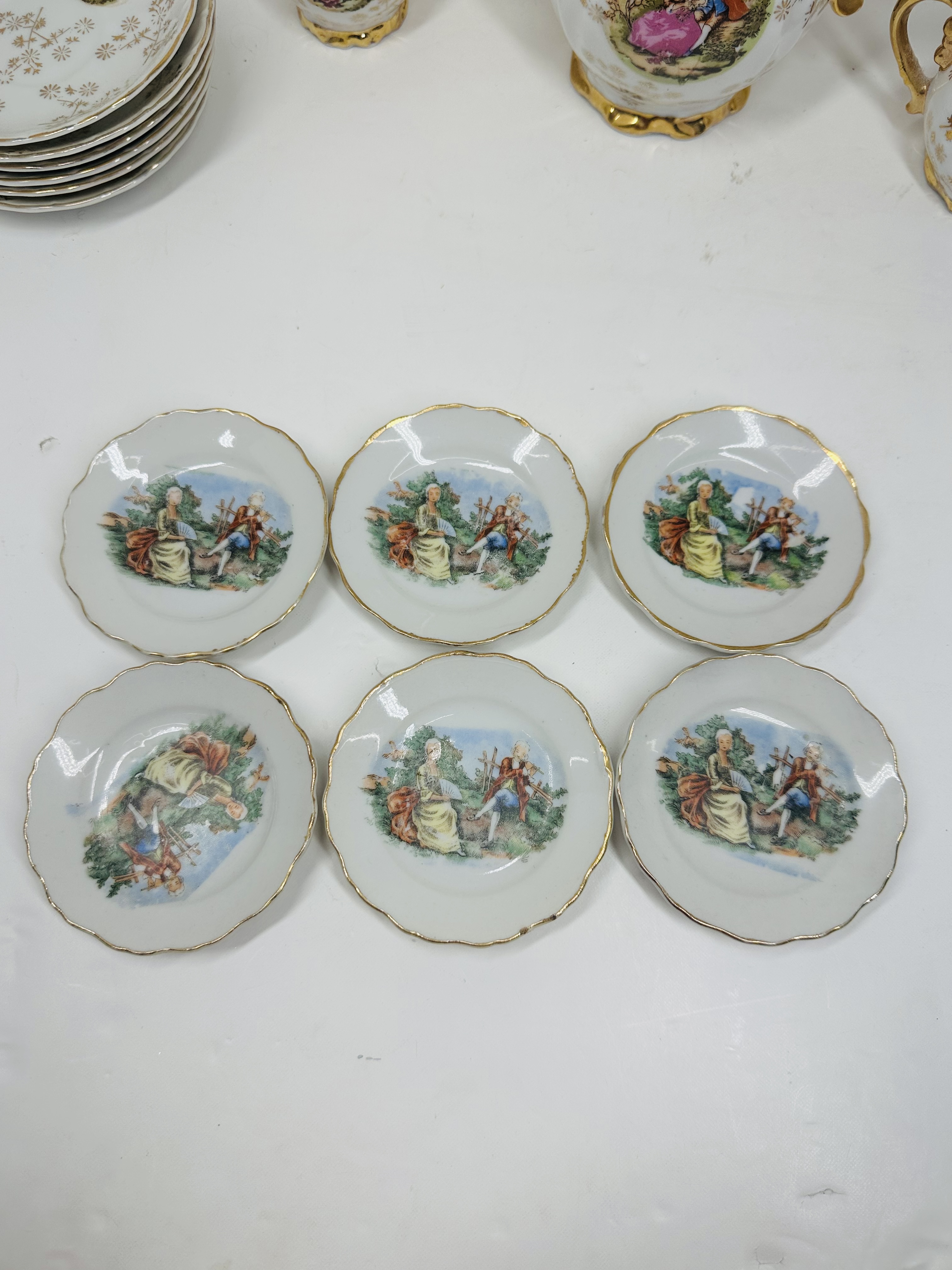 JAPANESE PORCELAIN 21-PIECE TEA SET, C. 1950