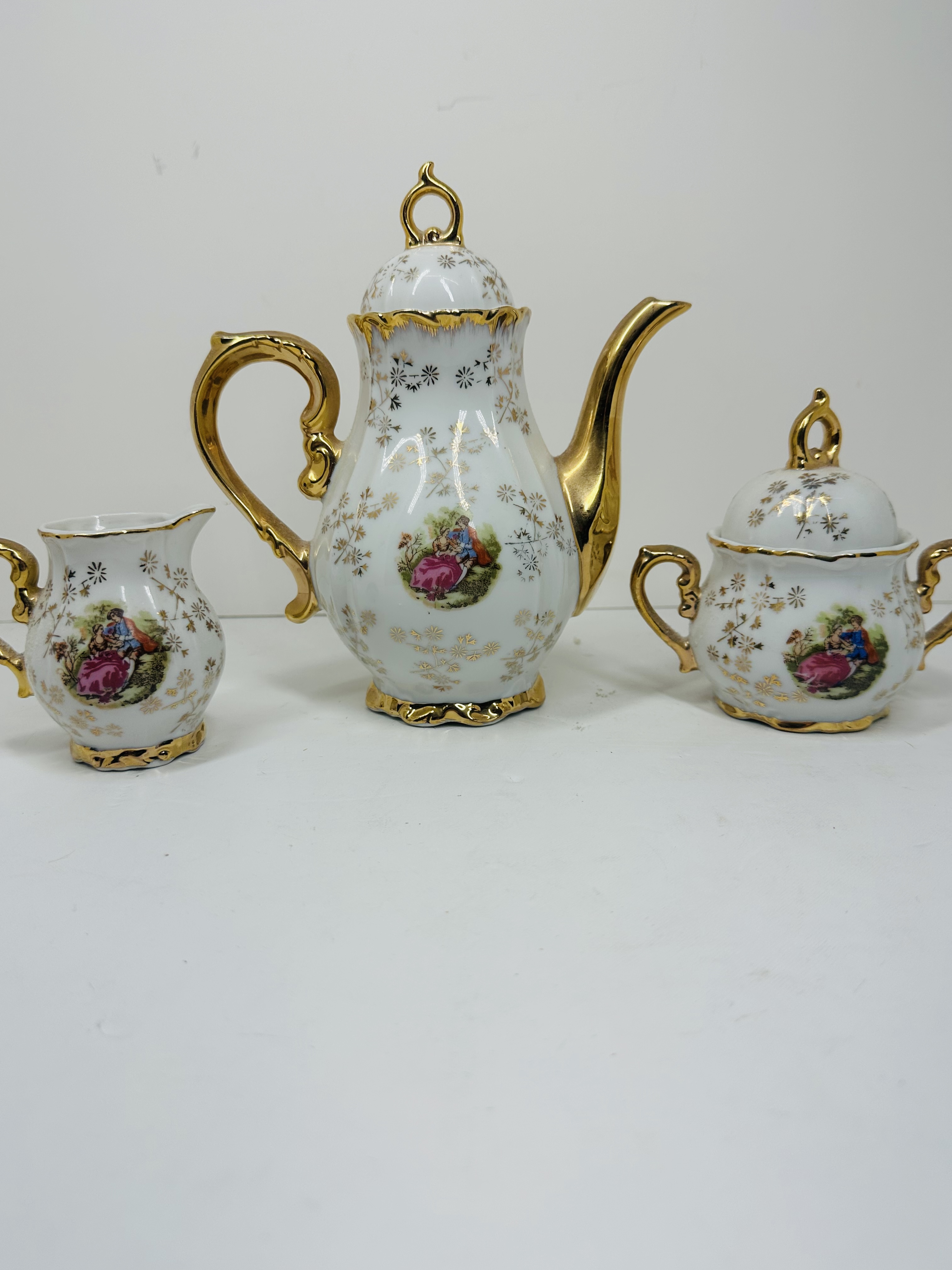 JAPANESE PORCELAIN 21-PIECE TEA SET, C. 1950
