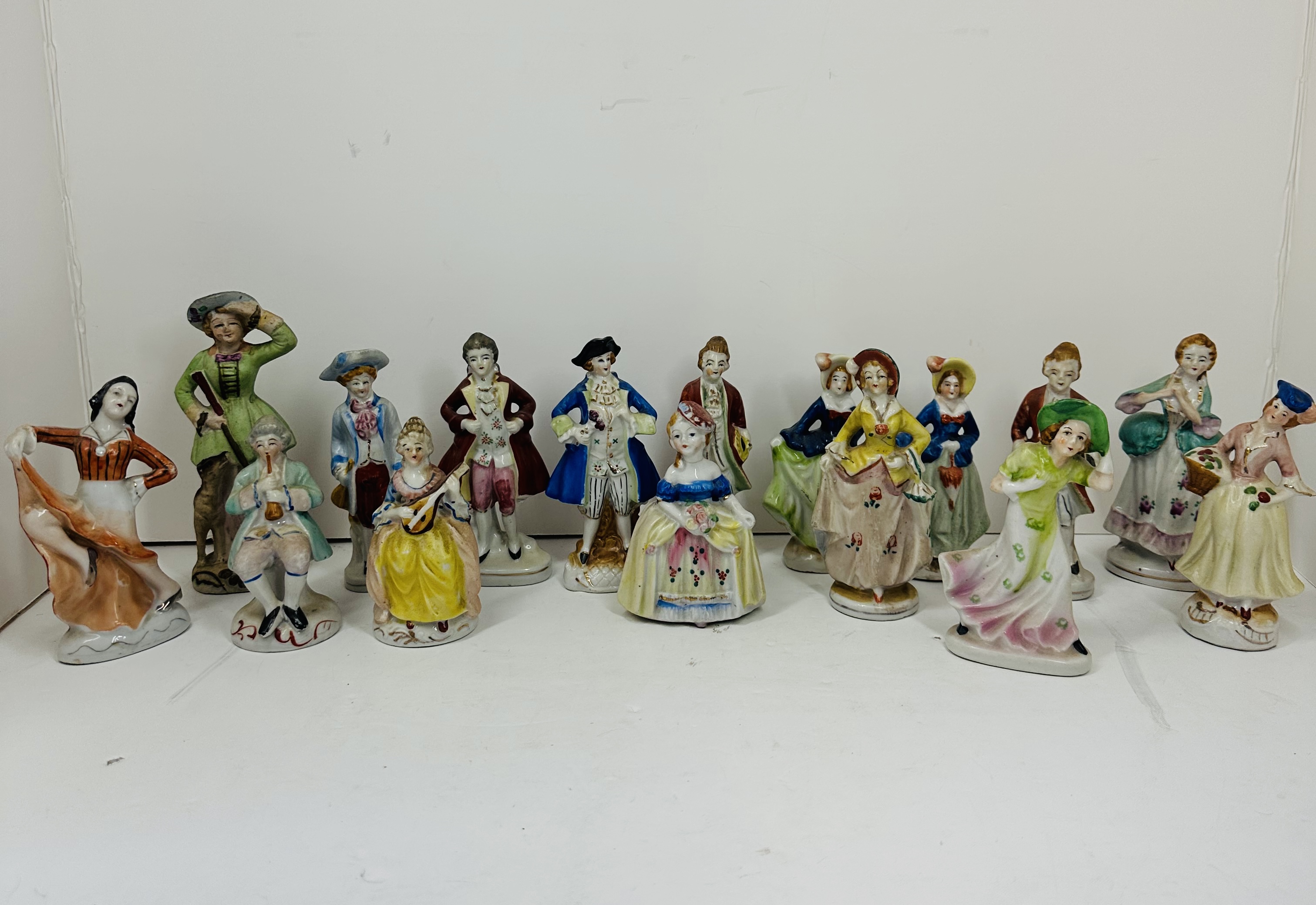 OCCUPIED JAPAN PORCELAIN COURTIER FIGURINES, 1945-1952