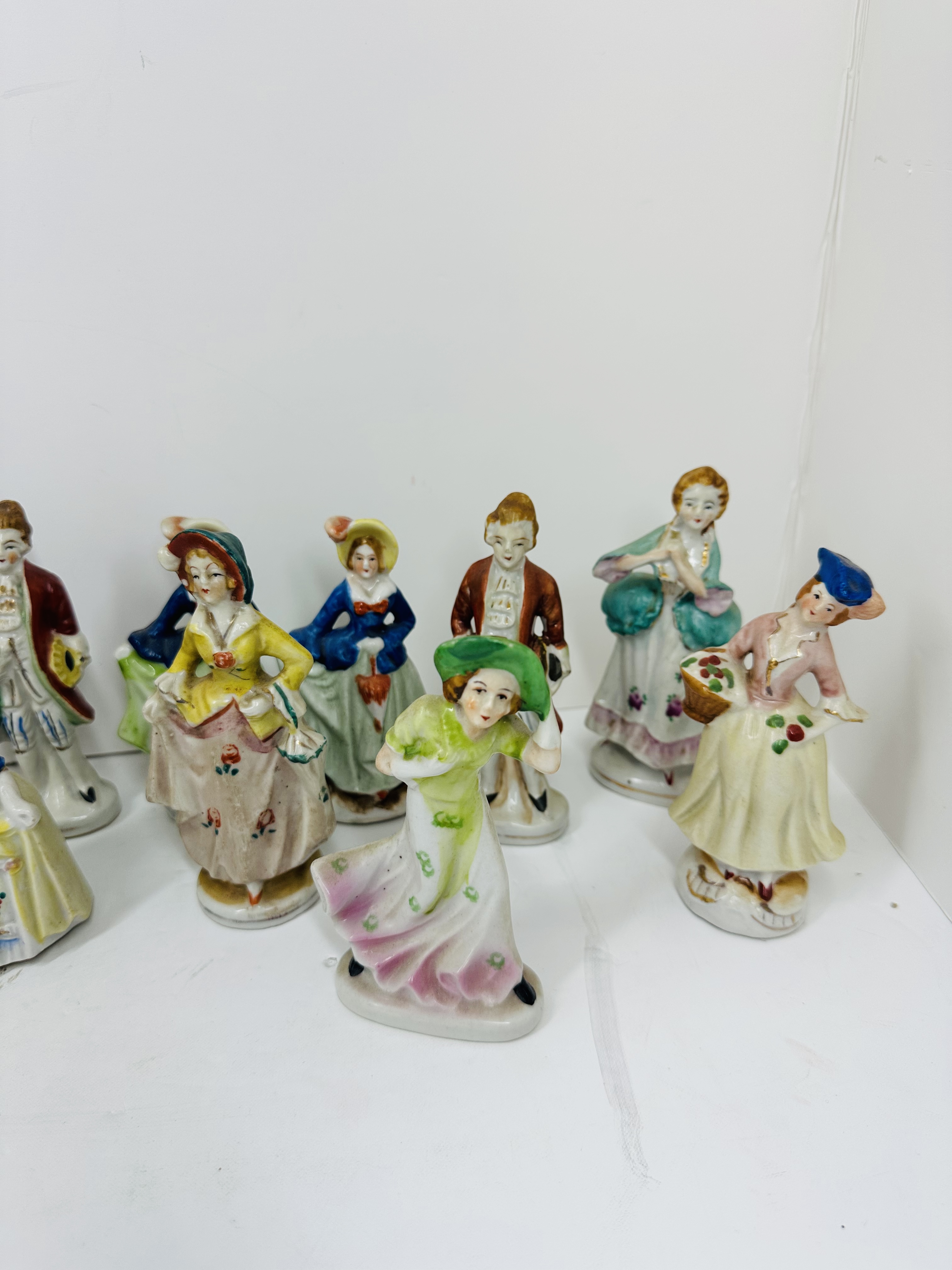 OCCUPIED JAPAN PORCELAIN COURTIER FIGURINES, 1945-1952