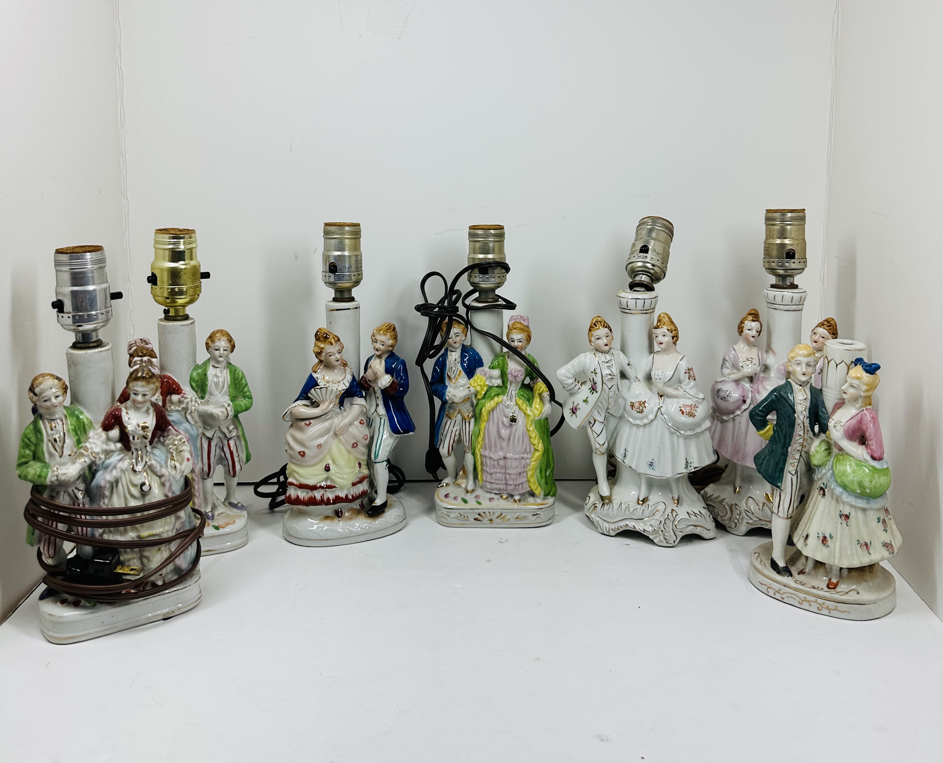 SEVEN COLONIAL STYLE PORCELAIN LAMPS