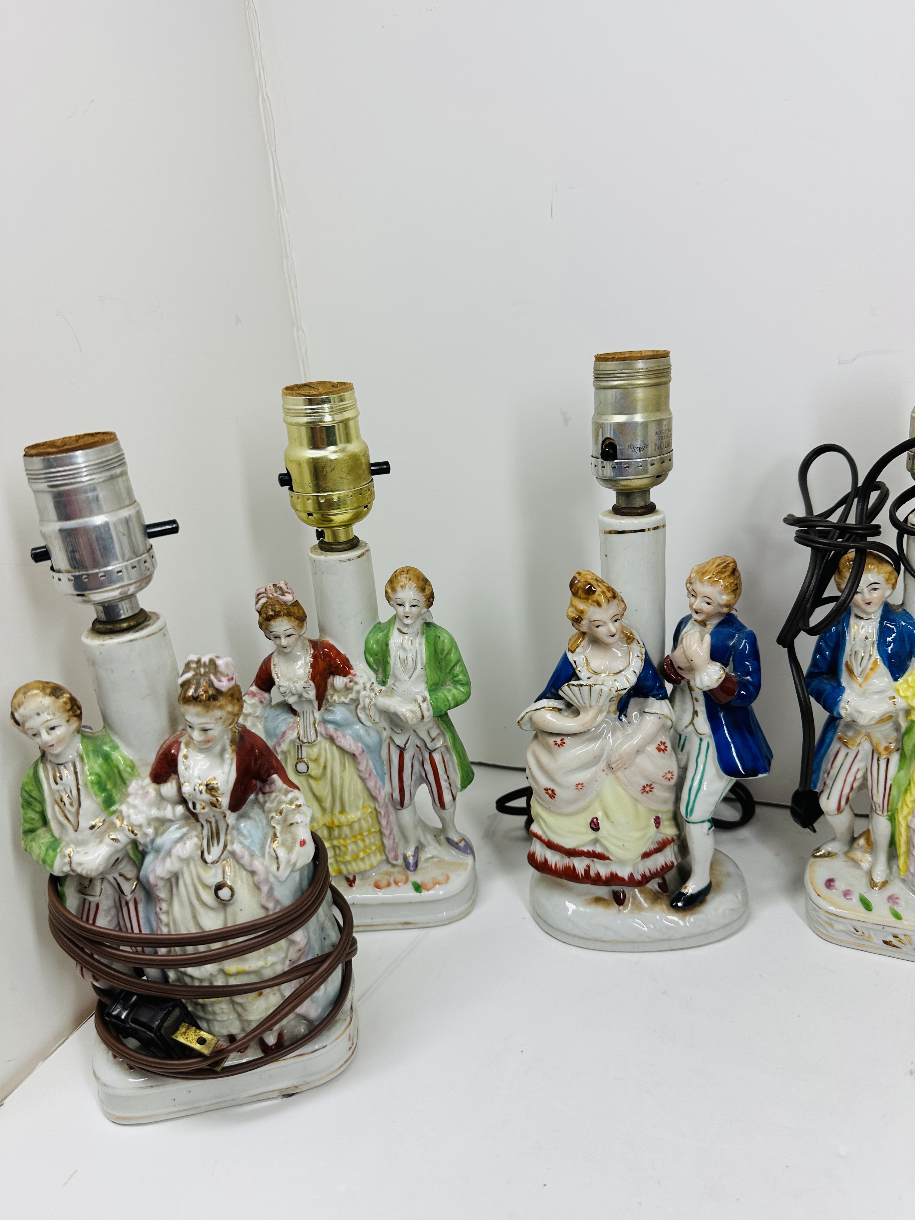 SEVEN COLONIAL STYLE PORCELAIN LAMPS