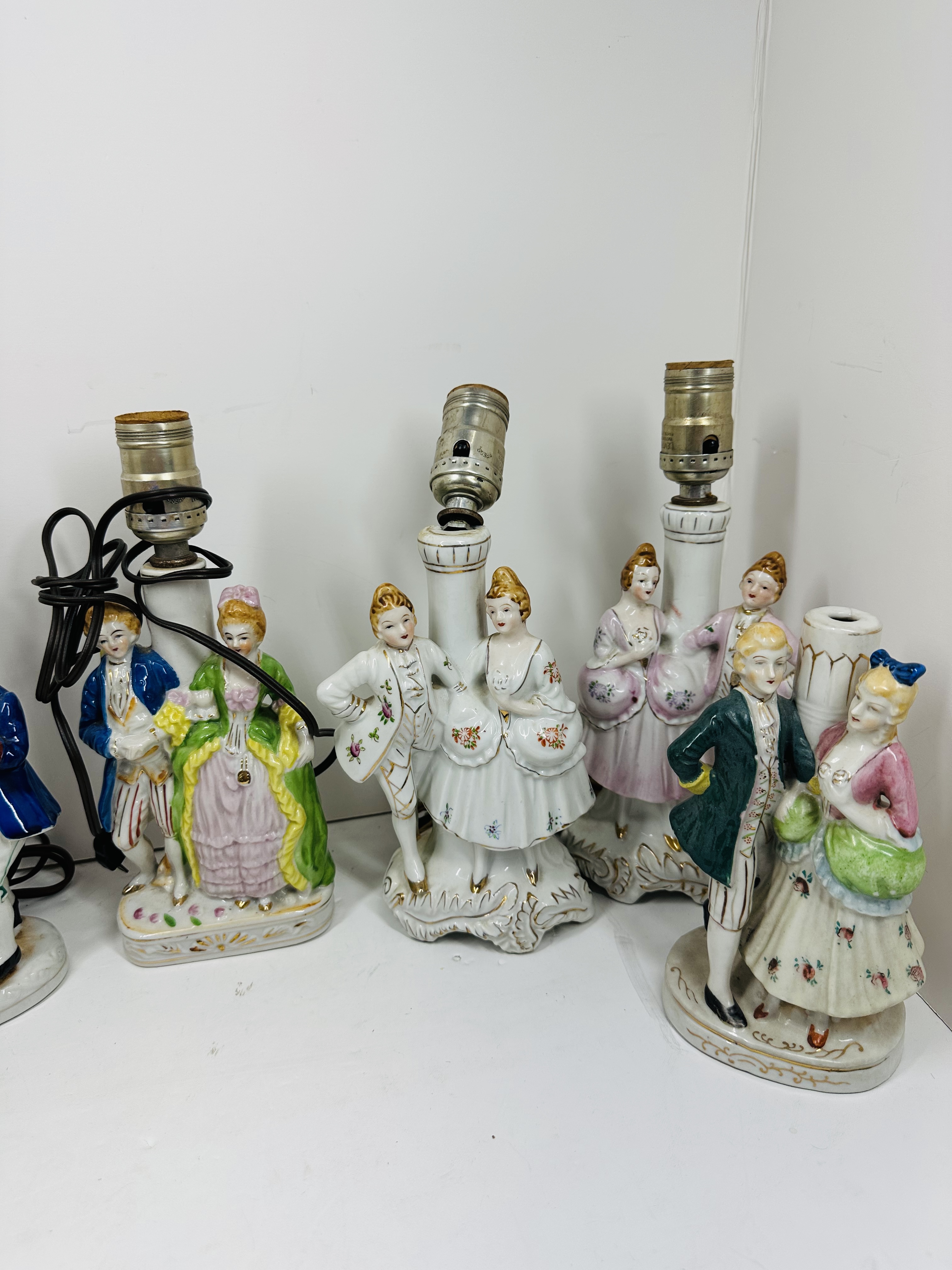 SEVEN COLONIAL STYLE PORCELAIN LAMPS