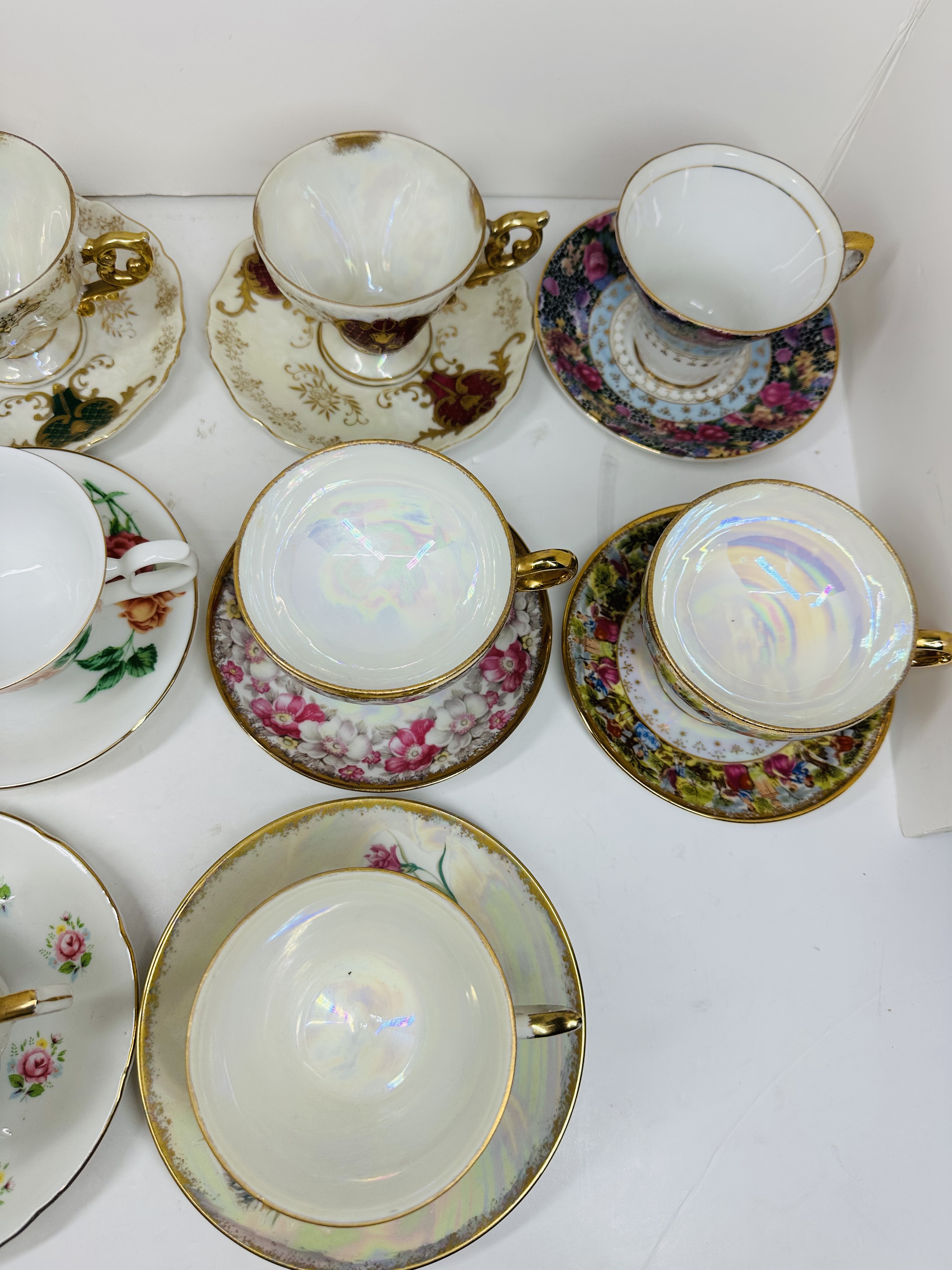 TEN PORCELAIN TEACUP SETS, MID-20TH CENTURY