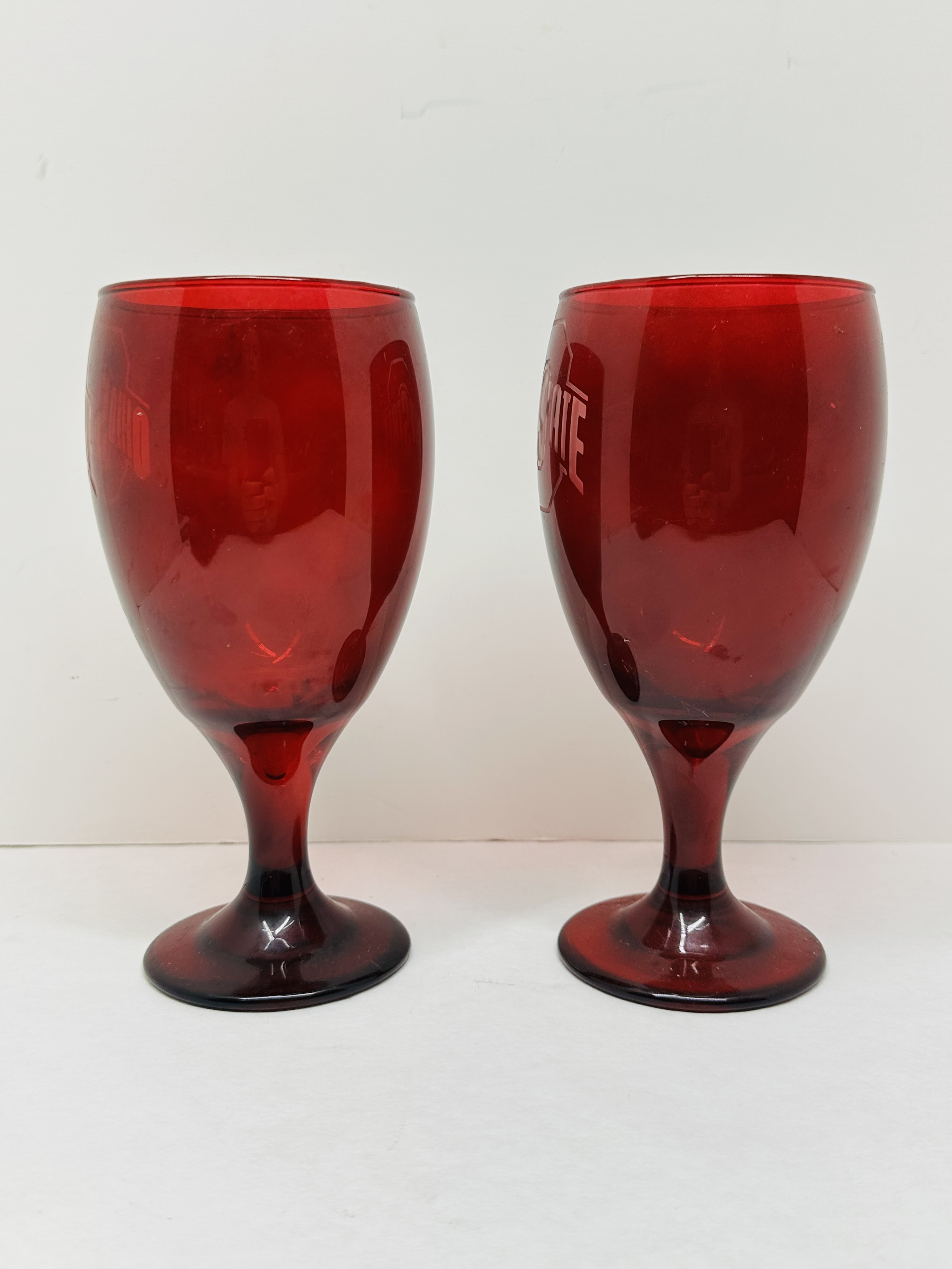 A PAIR OF MOSSER GLASS OHIO STATE UNIVERSITY SCARLET GOBLETS