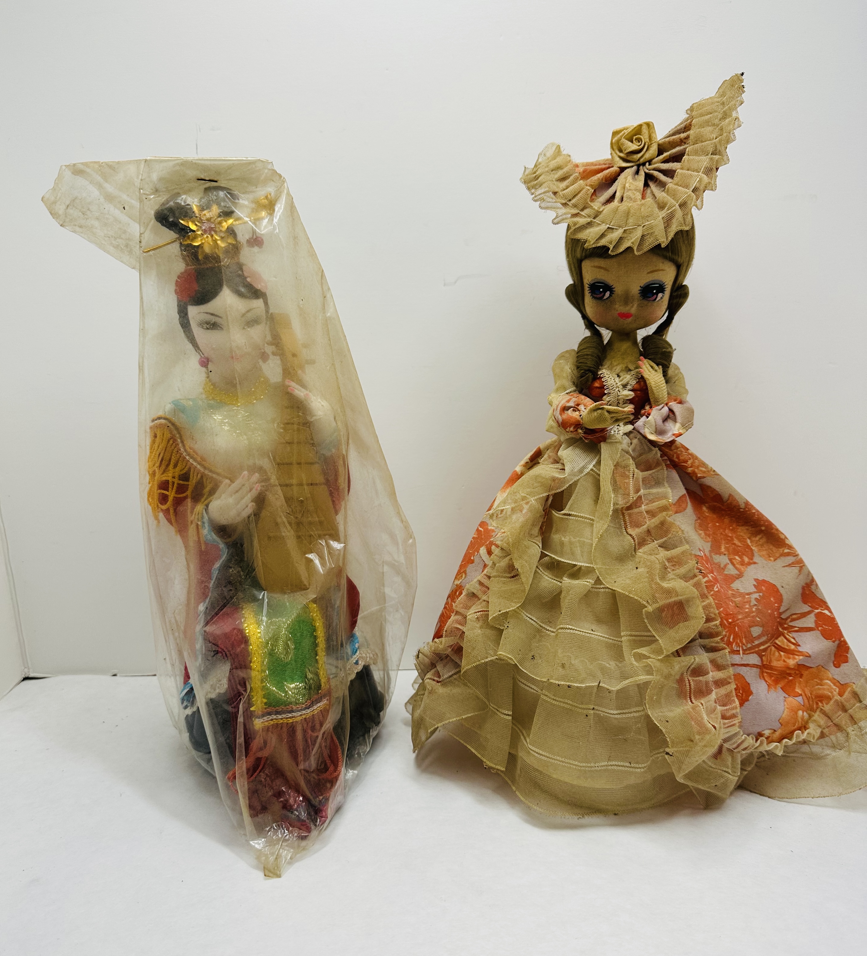 BRADLEY AND ASIAN VINTAGE DOLLS, 1970S