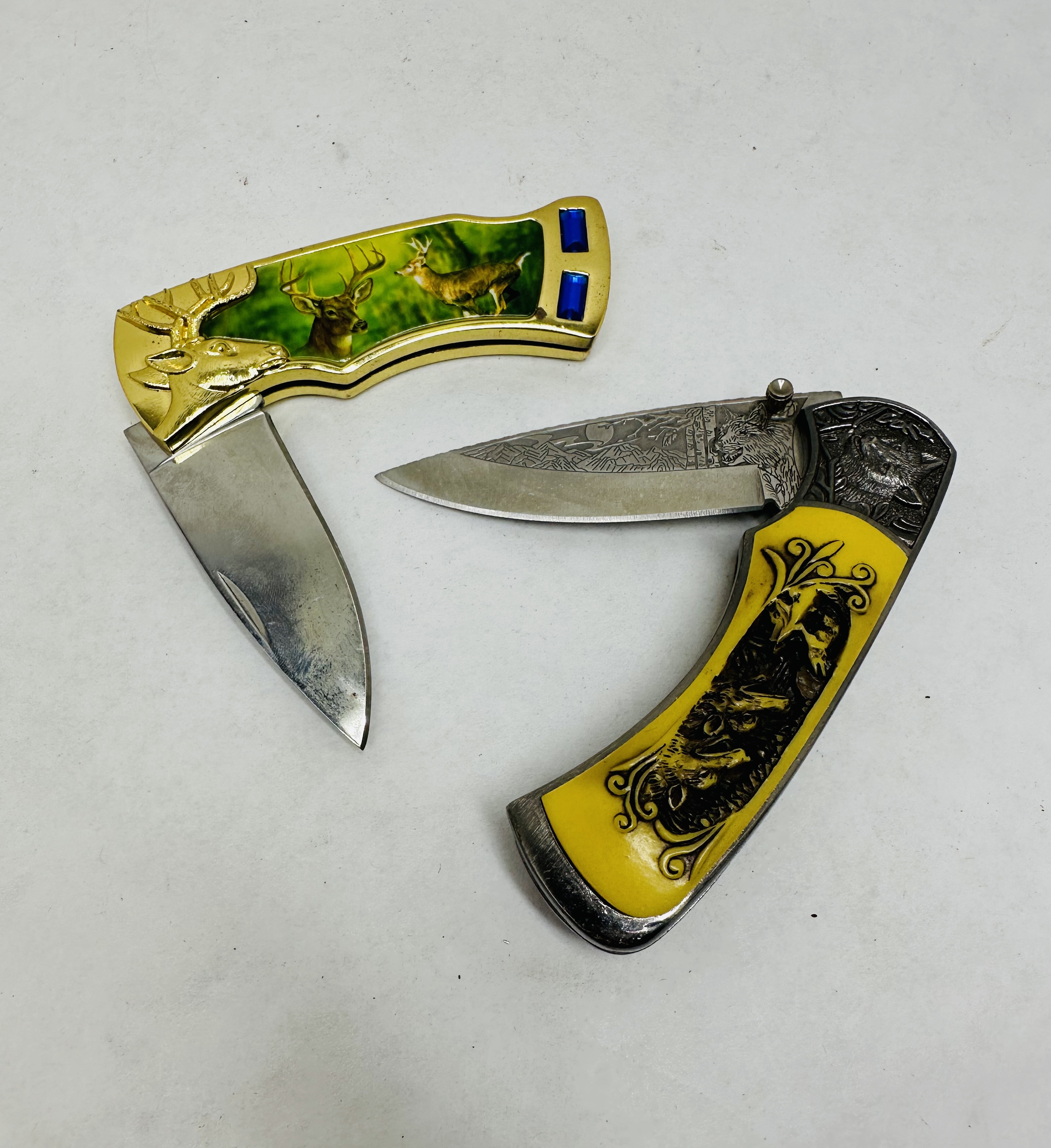 TWO STAINLESS STEEL WILDLIFE KNIVES