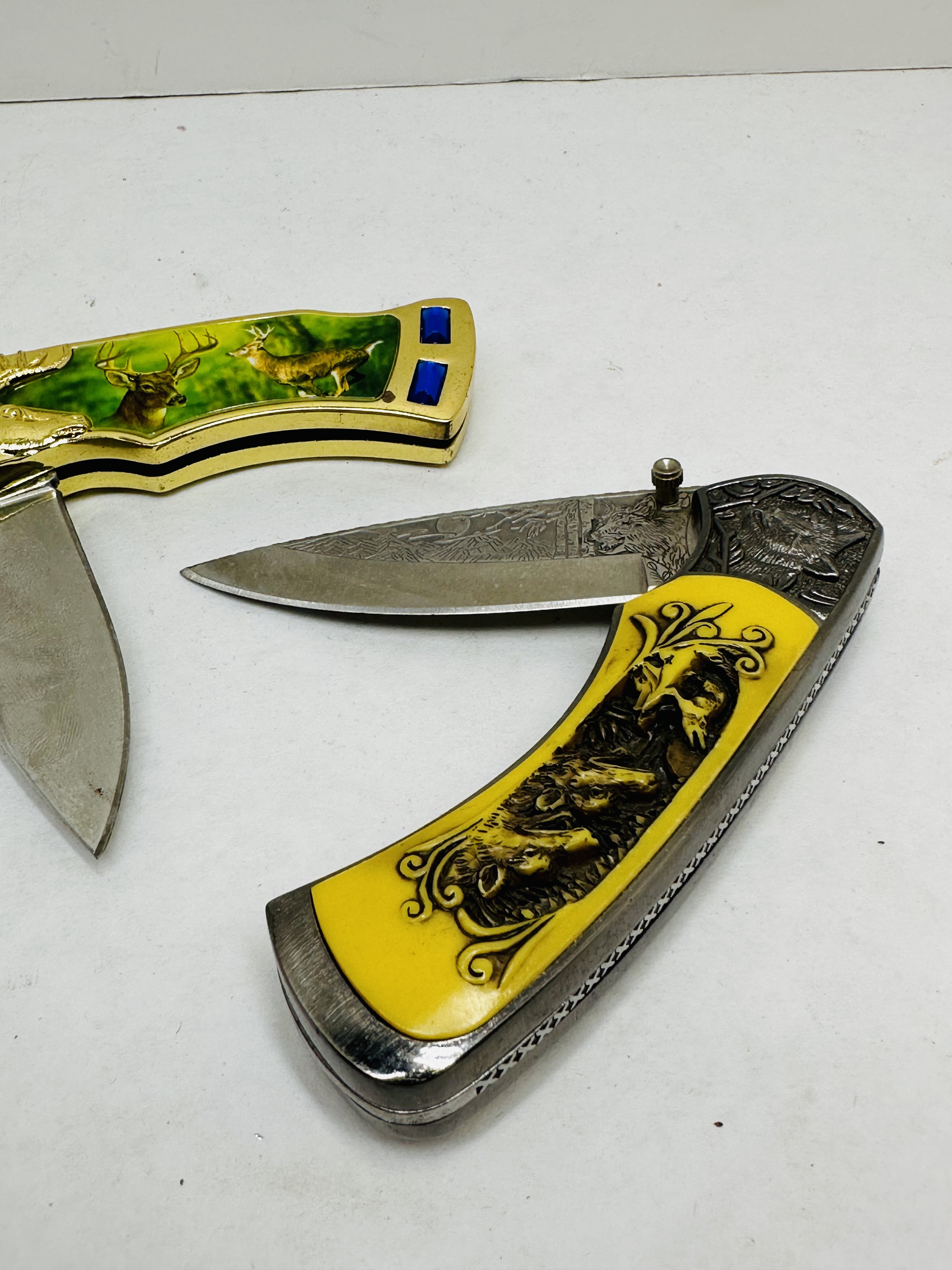 TWO STAINLESS STEEL WILDLIFE KNIVES